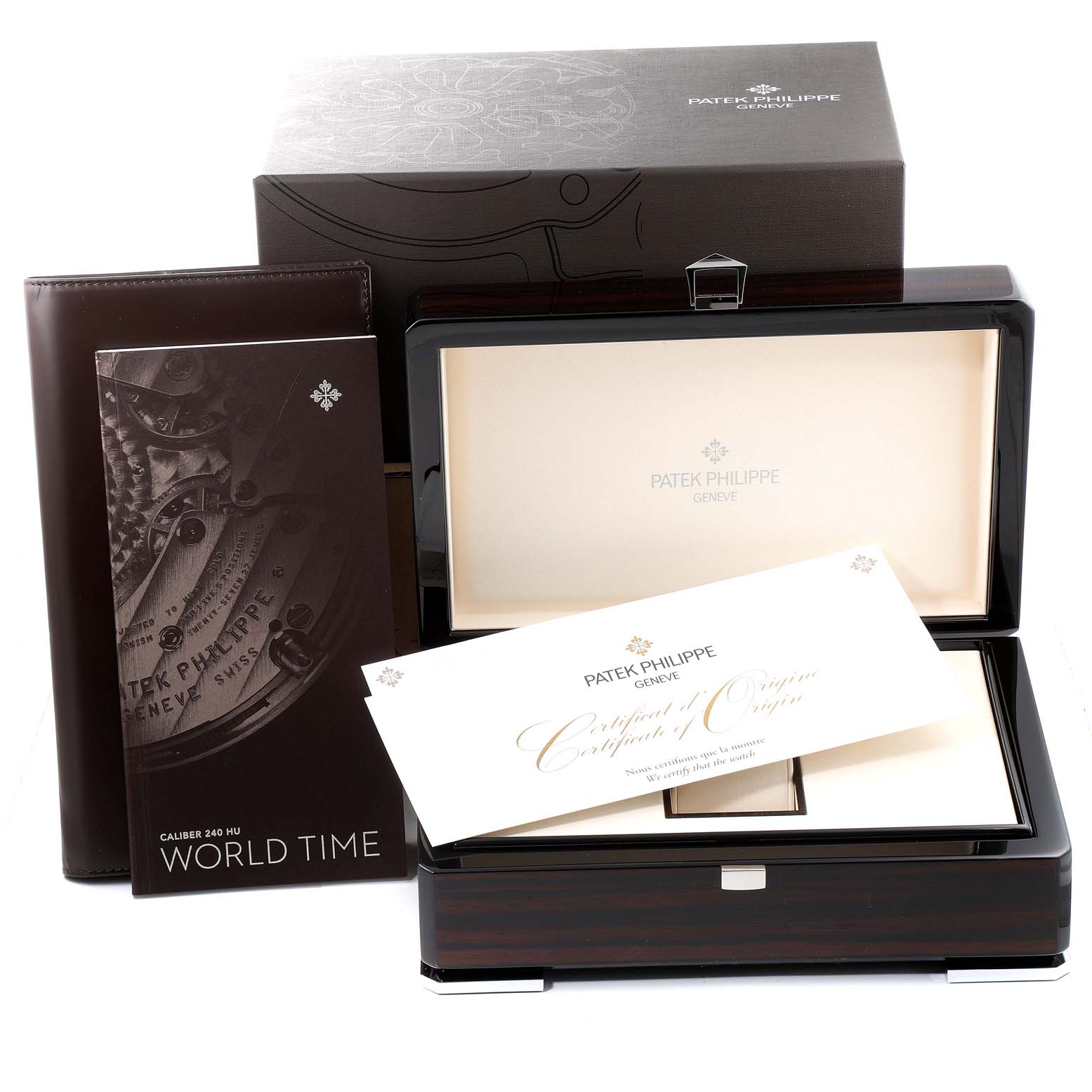This image shows the box, certificate, and booklet for the Patek Philippe Complications 5230G Men's White Gold Grey Dial 5230G Men's White Gold Grey Dial model watch.