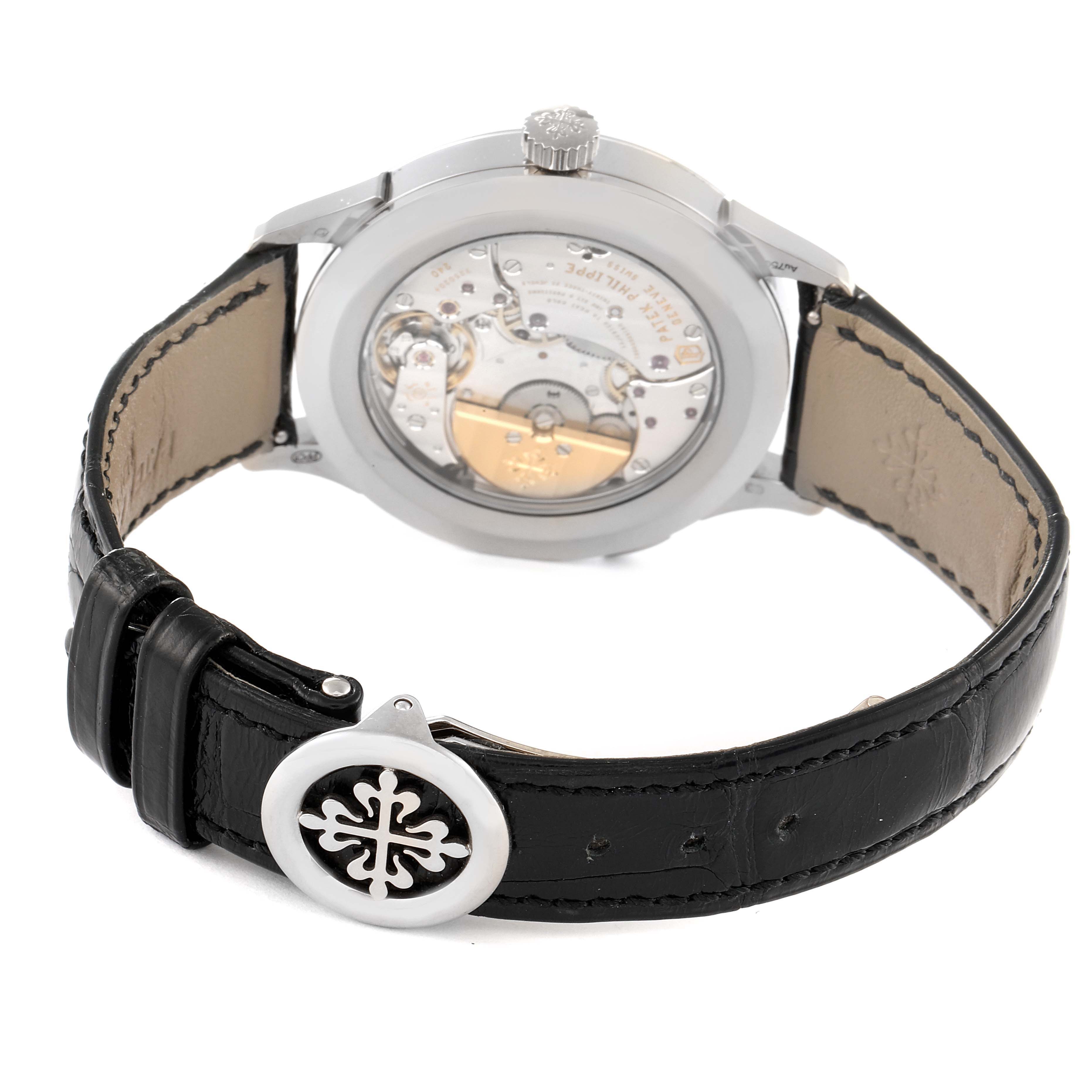 This image shows the back view of the Patek Philippe Complications 5230G Men's White Gold Grey Dial 5230G Men's White Gold Grey Dial watch, highlighting the movement and leather strap with clasp.