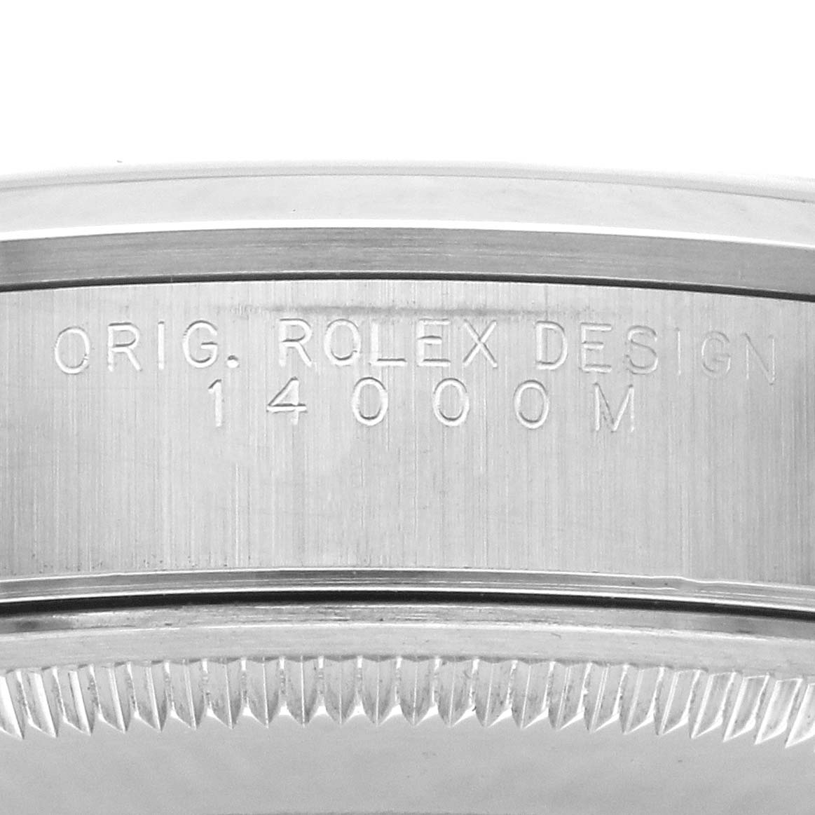 The image shows a close-up of the side of a Rolex Air-King 14000 Men's Stainless Steel Blue Dial 14000 Men's Stainless Steel Blue Dial watch, highlighting the original design engraving and serrated bezel edge.