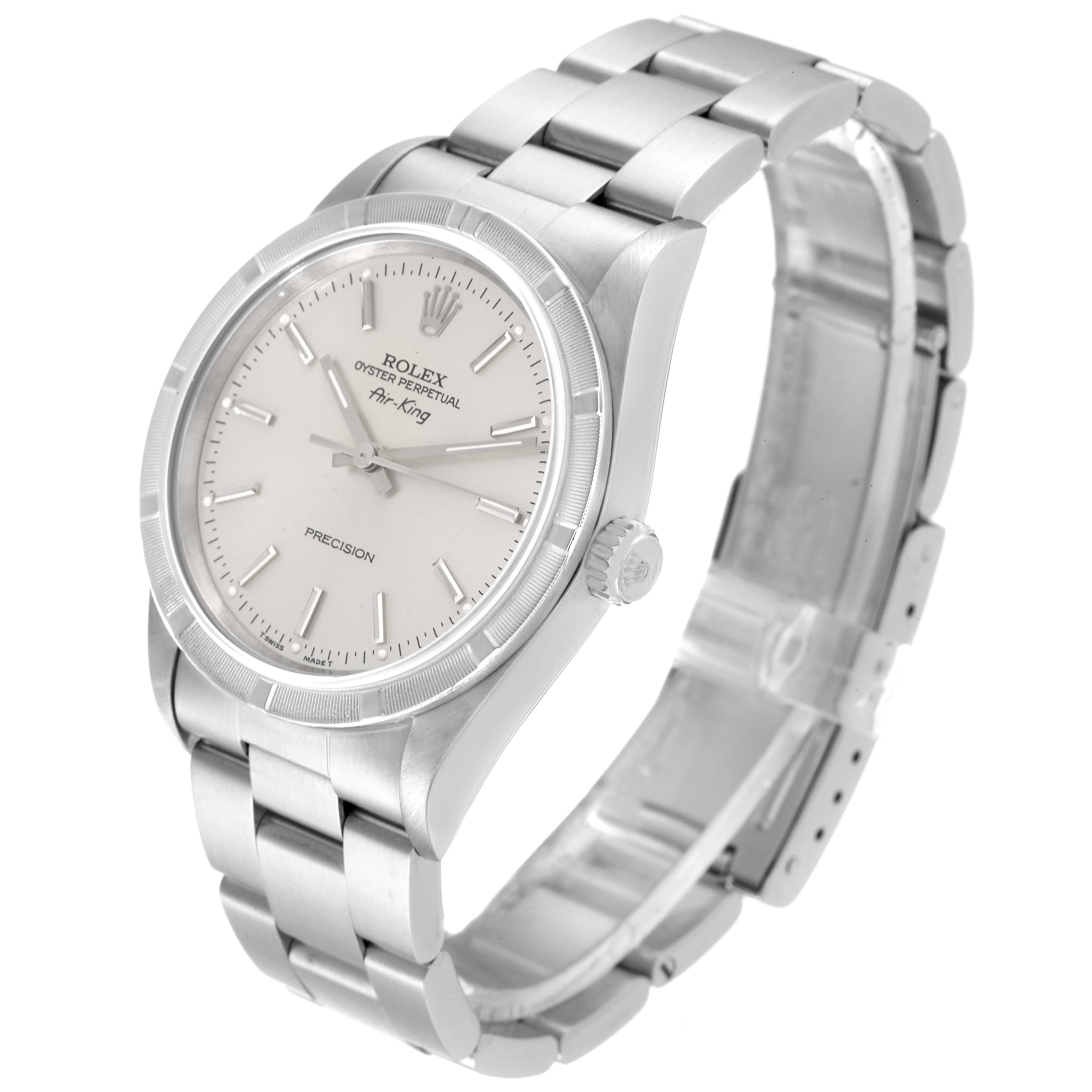 The Rolex Air-King 14010 Men's Stainless Steel Silver Dial 14010 Men's Stainless Steel Silver Dial watch is shown at a slight side angle, displaying its face, crown, and metal bracelet.