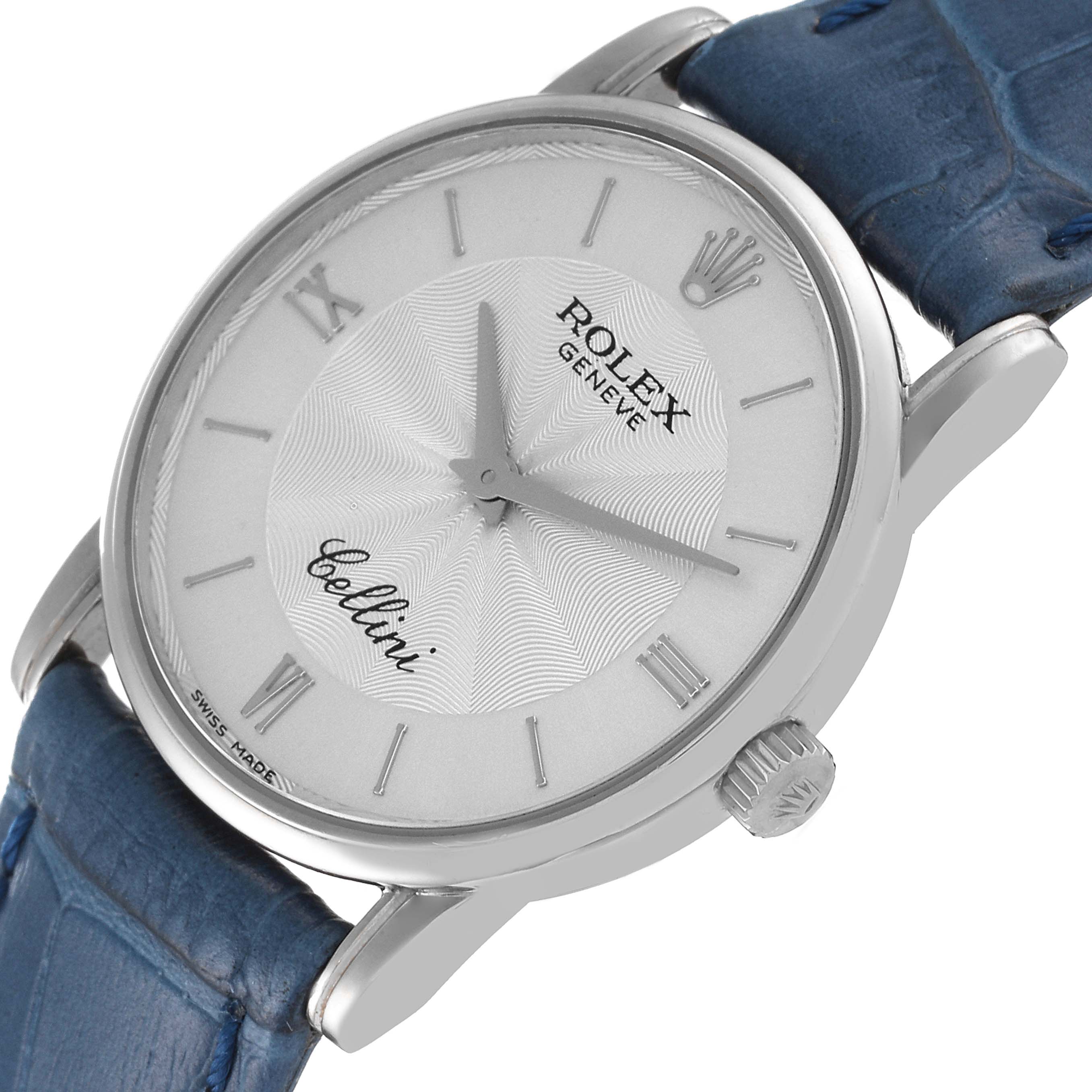 The image shows a close-up, angled view of the Rolex Cellini 5116 Men's White Gold Silver Dial 5116 Men's White Gold Silver Dial watch, highlighting its dial, crown, and part of the strap.