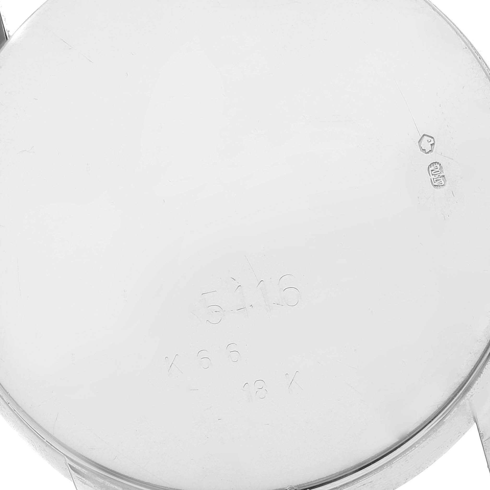 This image shows the back case of a Rolex Cellini 5116 Men's White Gold Silver Dial 5116 Men's White Gold Silver Dial model, focusing on the markings and engravings.