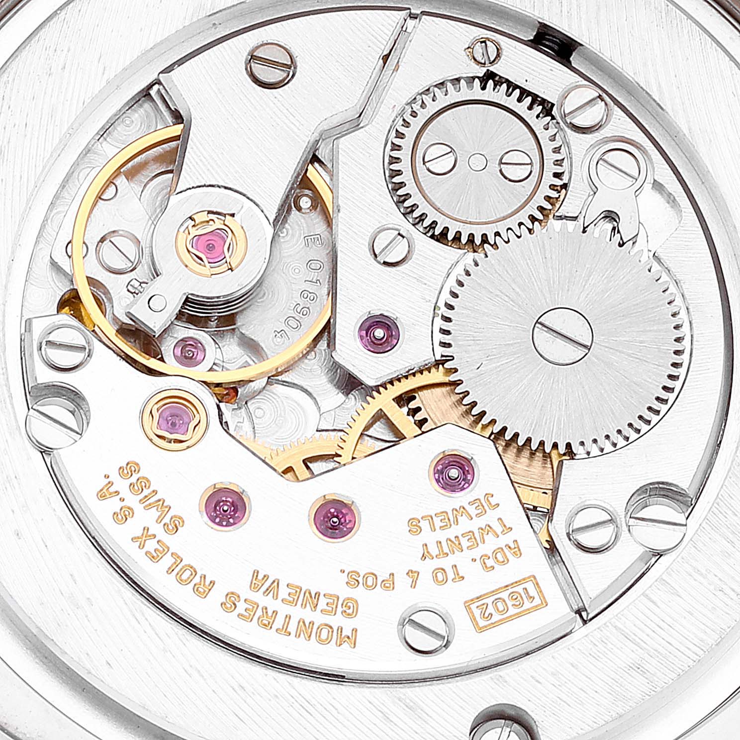 This image shows a close-up view of the Rolex Cellini 4233 Men
s White Gold Black Dial 4233 Men
s White Gold Black Dial watch movement, highlighting gears, jewels, and engravings.
