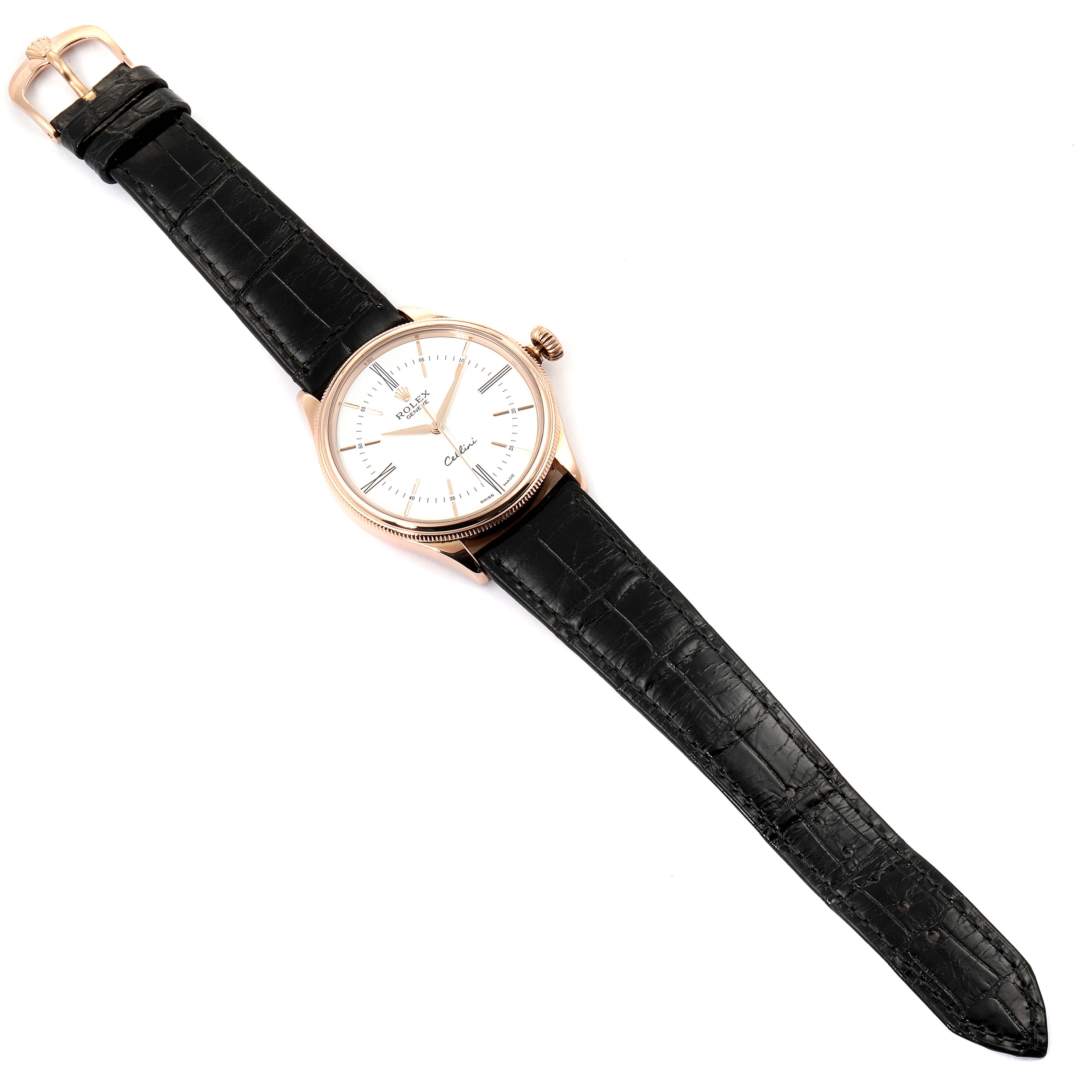 The image shows a Rolex Cellini 50505 Men
s Rose Gold White Dial 50505 Men
s Rose Gold White Dial watch from an angled top-down perspective, displaying its face, leather band, and buckle.