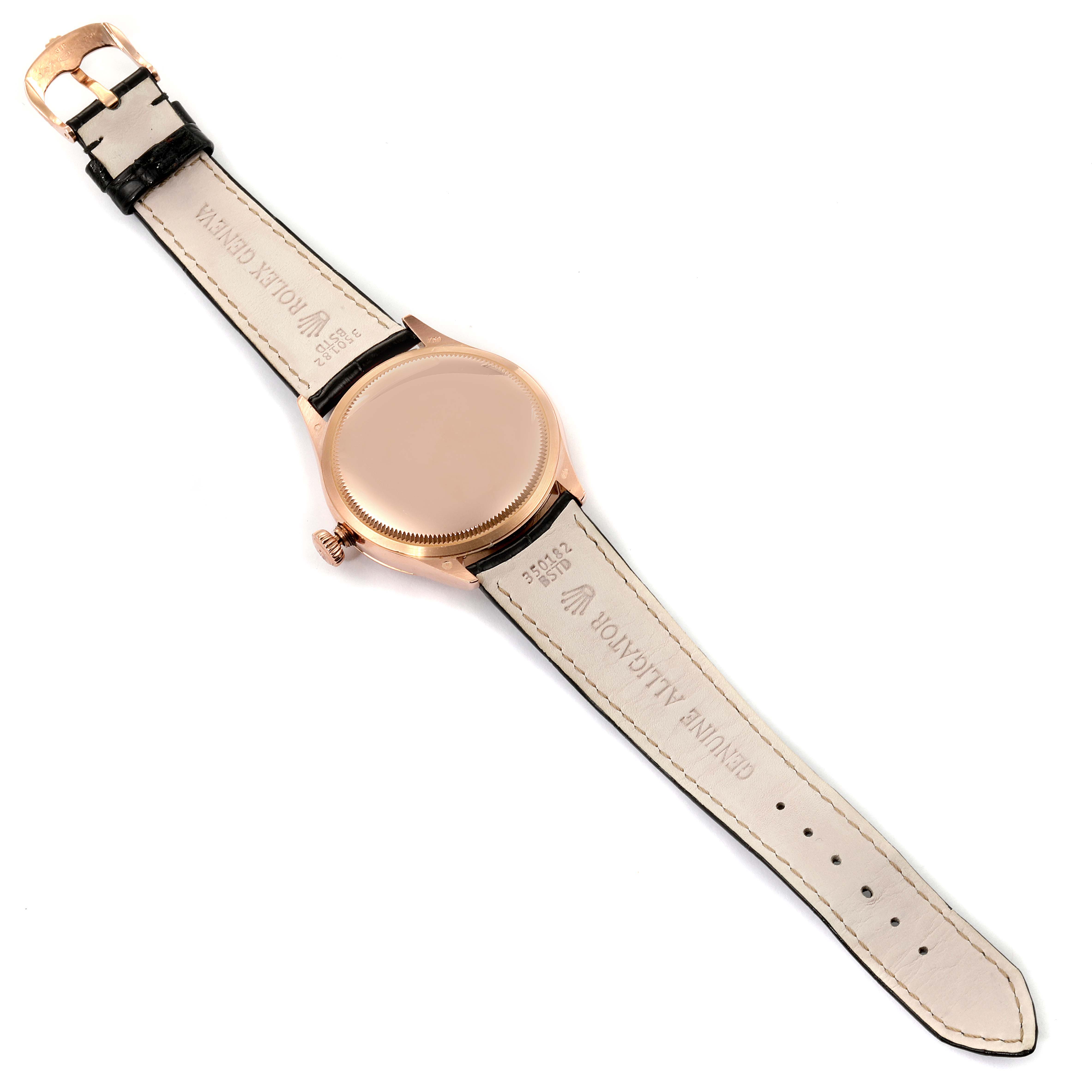 The Rolex Cellini 50505 Men
s Rose Gold White Dial 50505 Men
s Rose Gold White Dial watch is displayed from the back, showing its case, crown, and leather strap.