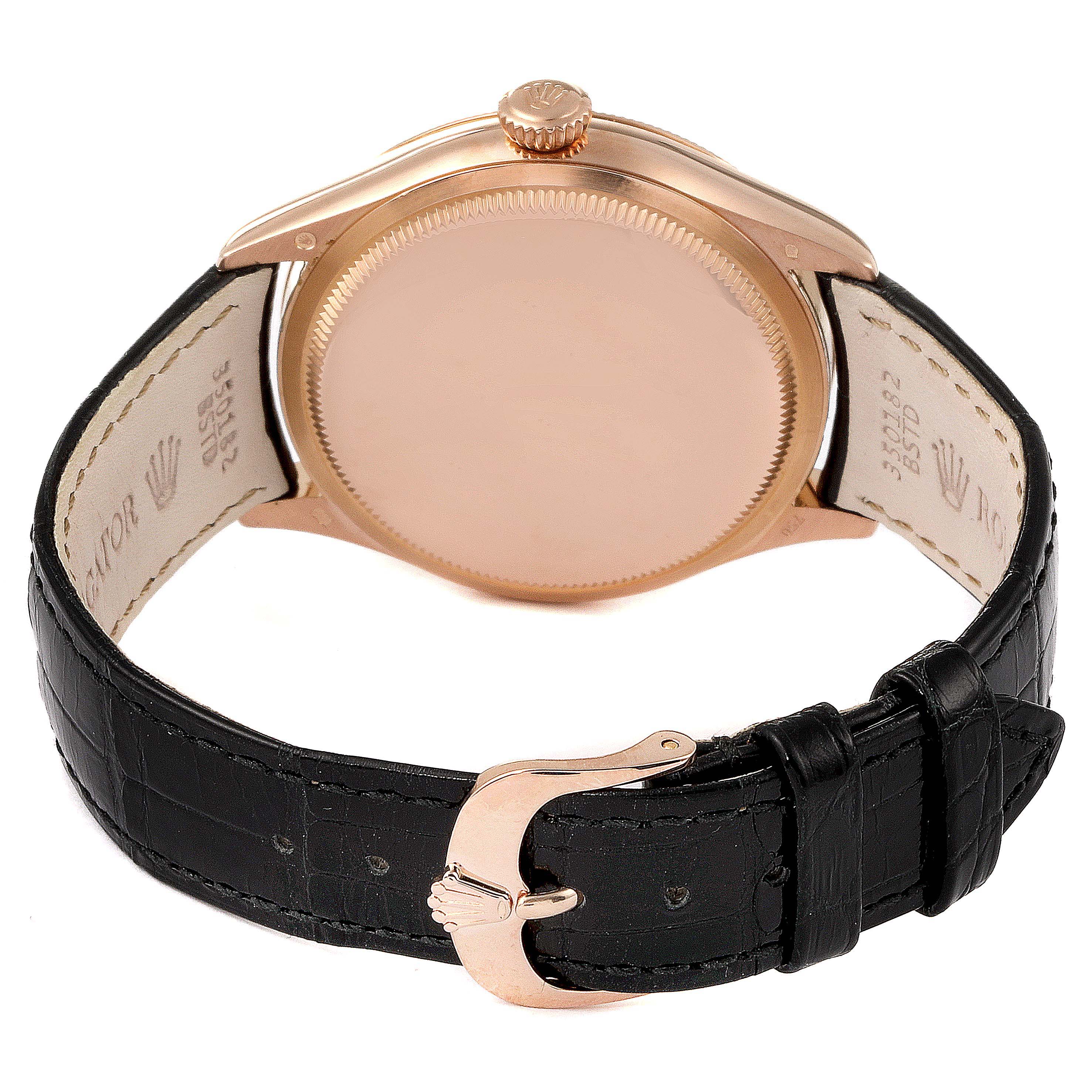 The image shows the back view of a Rolex Cellini 50505 Men
s Rose Gold White Dial 50505 Men
s Rose Gold White Dial watch, including the case back, leather strap, and buckle.
