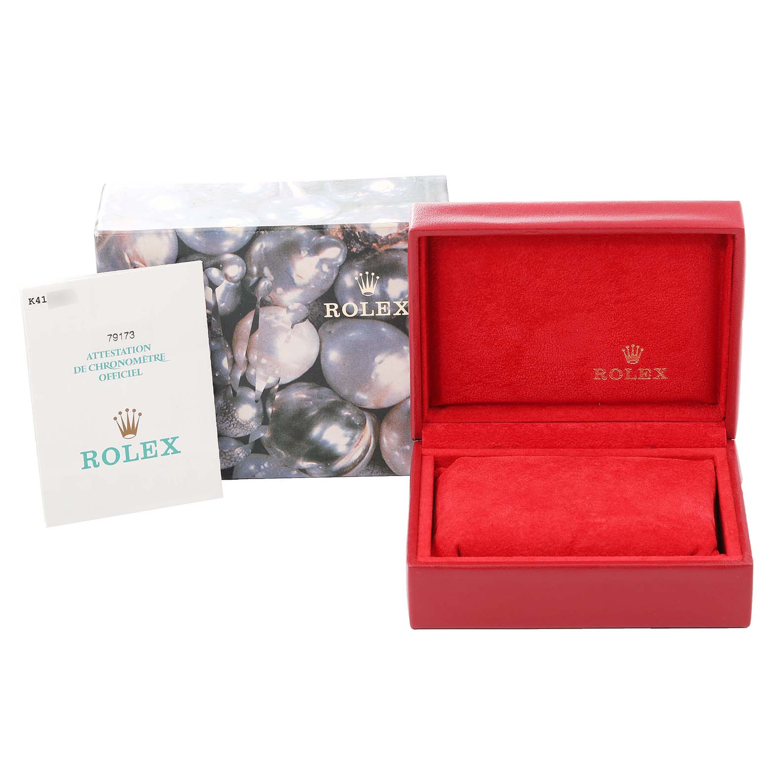 The image shows a Rolex Datejust 79173 Women's Steel and Gold (two tone) Beige Dial 79173 Women's Steel and Gold (two tone) Beige Dial box, outer packaging, and certification card from an angled view.