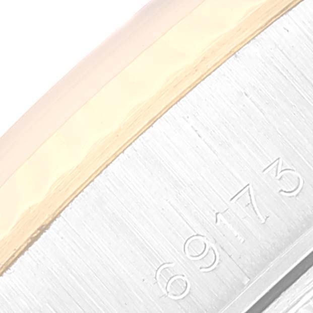 This close-up image shows the Datejust model number engraved on the side of a Rolex case.