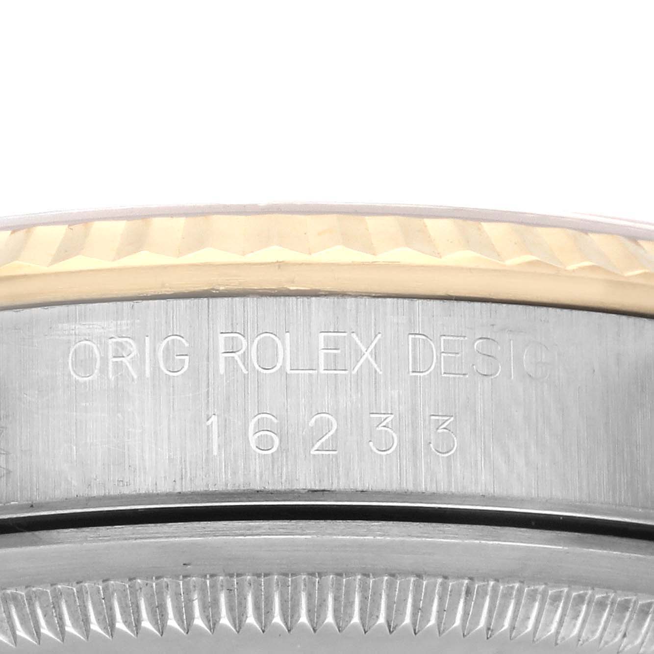 The image shows the side of a Rolex Datejust 16233 Men's Steel and Gold (two tone) Champagne Dial 16233 Men's Steel and Gold (two tone) Champagne Dial watch, highlighting the engraved model number and part of the bezel.