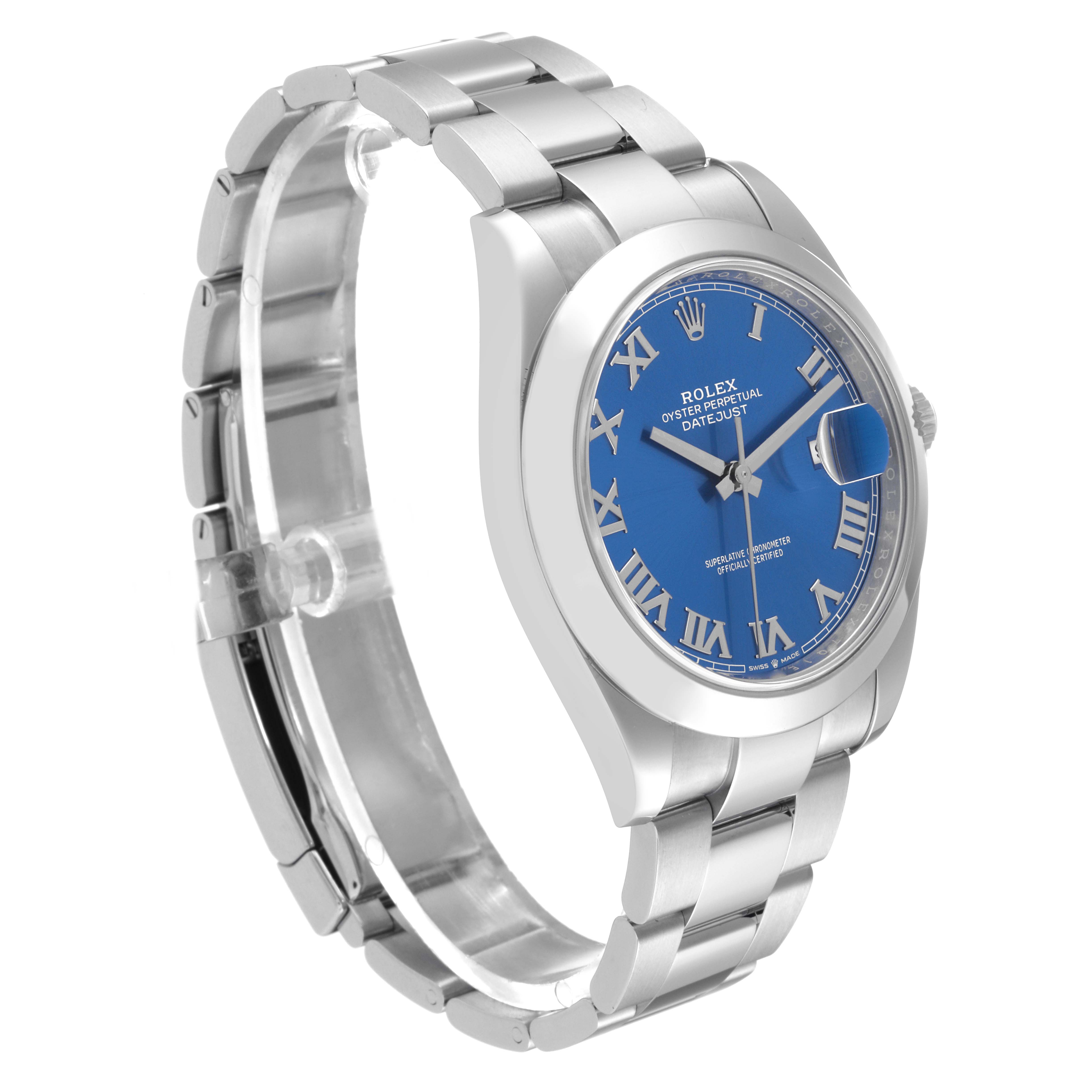 The image shows a side-angle view of the Rolex Datejust 41 126300 Men
s Stainless Steel Blue Dial 126300 Men
s Stainless Steel Blue Dial watch, highlighting its blue dial, Roman numerals, and metal bracelet.