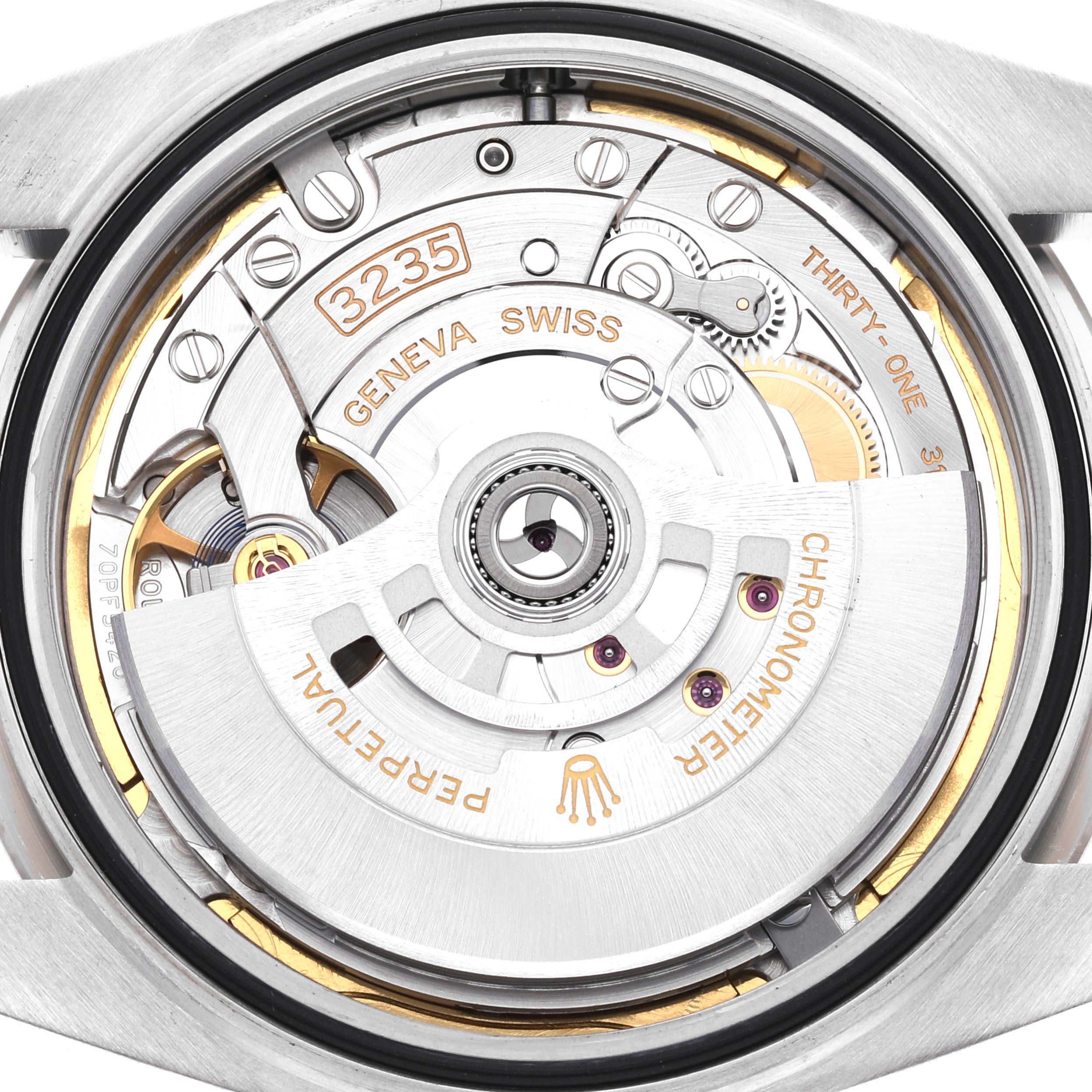 This is an image of the movement of a Rolex Datejust 41 126334 Men
s Stainless Steel Blue Dial 126334 Men
s Stainless Steel Blue Dial, including the rotor and other inner mechanisms.