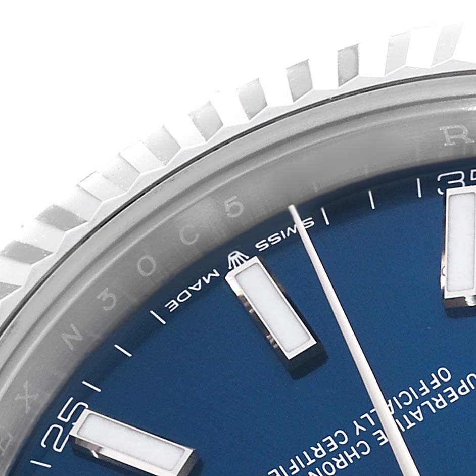 This close-up shows a partial view of the bezel, chapter ring, and dial of the Rolex Datejust 41 126334 Men
s Stainless Steel Blue Dial 126334 Men
s Stainless Steel Blue Dial with a blue face.