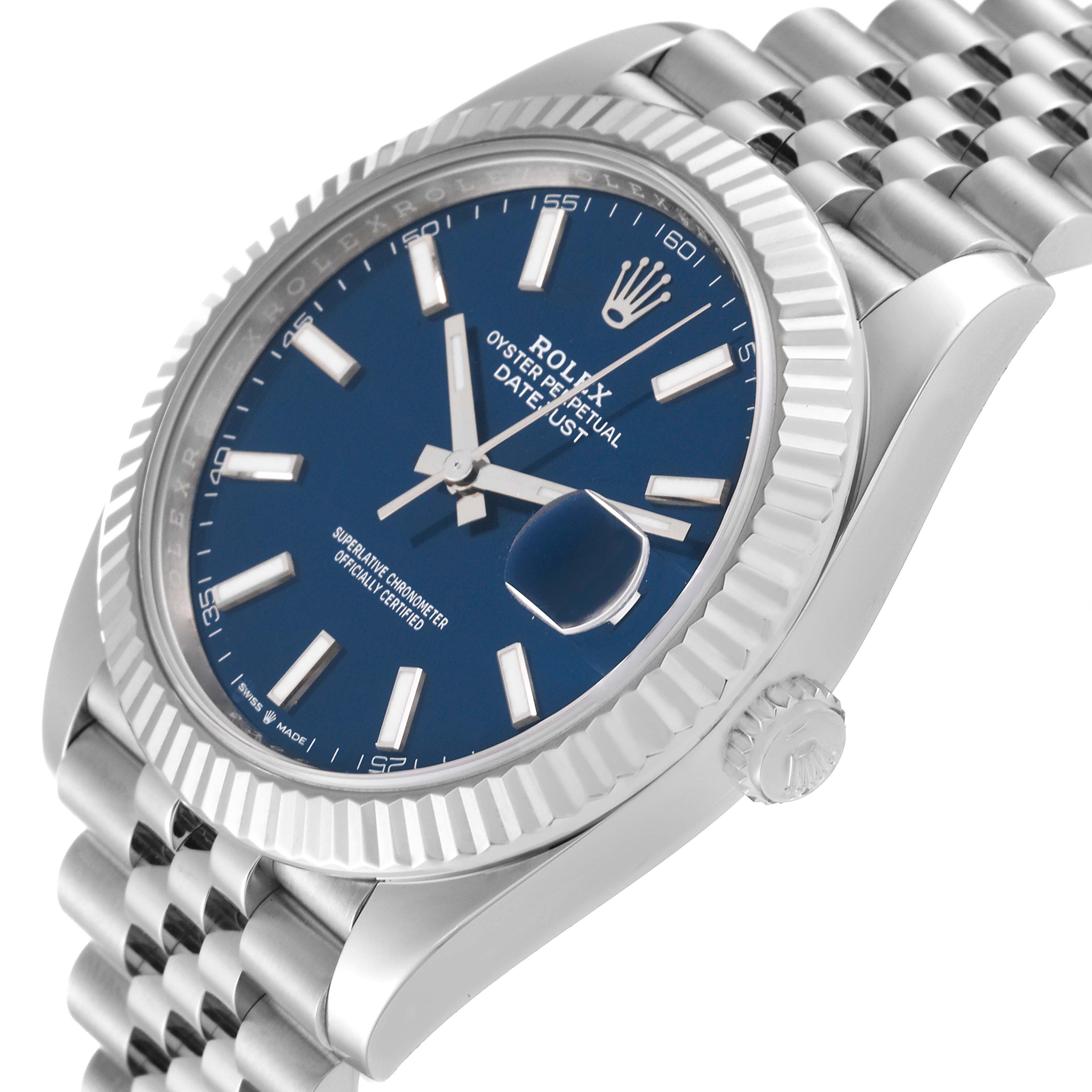 The image shows the Rolex Datejust 41 126334 Men
s Stainless Steel Blue Dial 126334 Men
s Stainless Steel Blue Dial watch at a tilted angle, highlighting its blue dial, fluted bezel, and Jubilee bracelet.