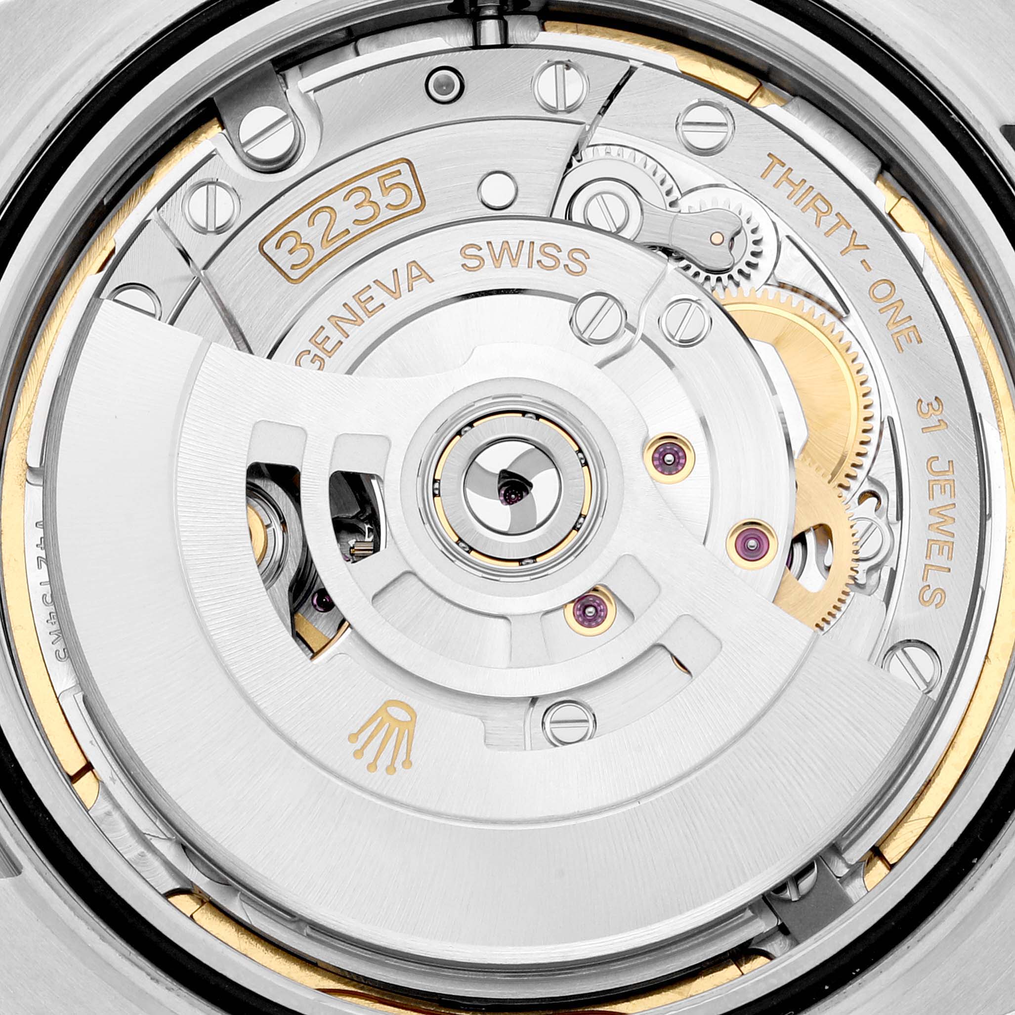 The image shows a close-up view of the Rolex Datejust 41 126334 Men
s Stainless Steel Blue Dial 126334 Men
s Stainless Steel Blue Dial
s automatic movement, highlighting the intricate components and "3235" caliber.