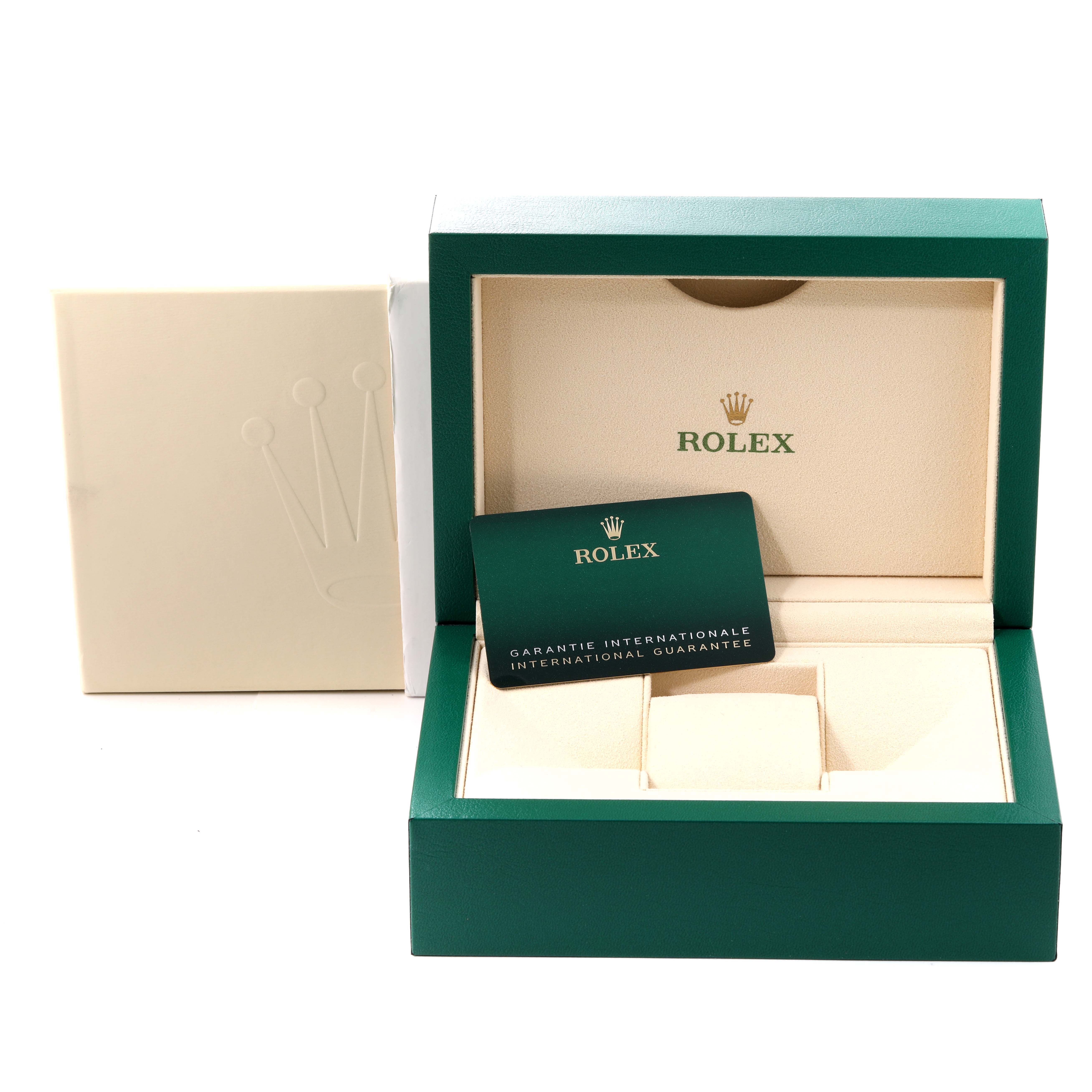 The image shows the box and international guarantee card for a Rolex Datejust 41 126333 Men's Steel and Gold (two tone) Champagne Dial 126333 Men's Steel and Gold (two tone) Champagne Dial watch.