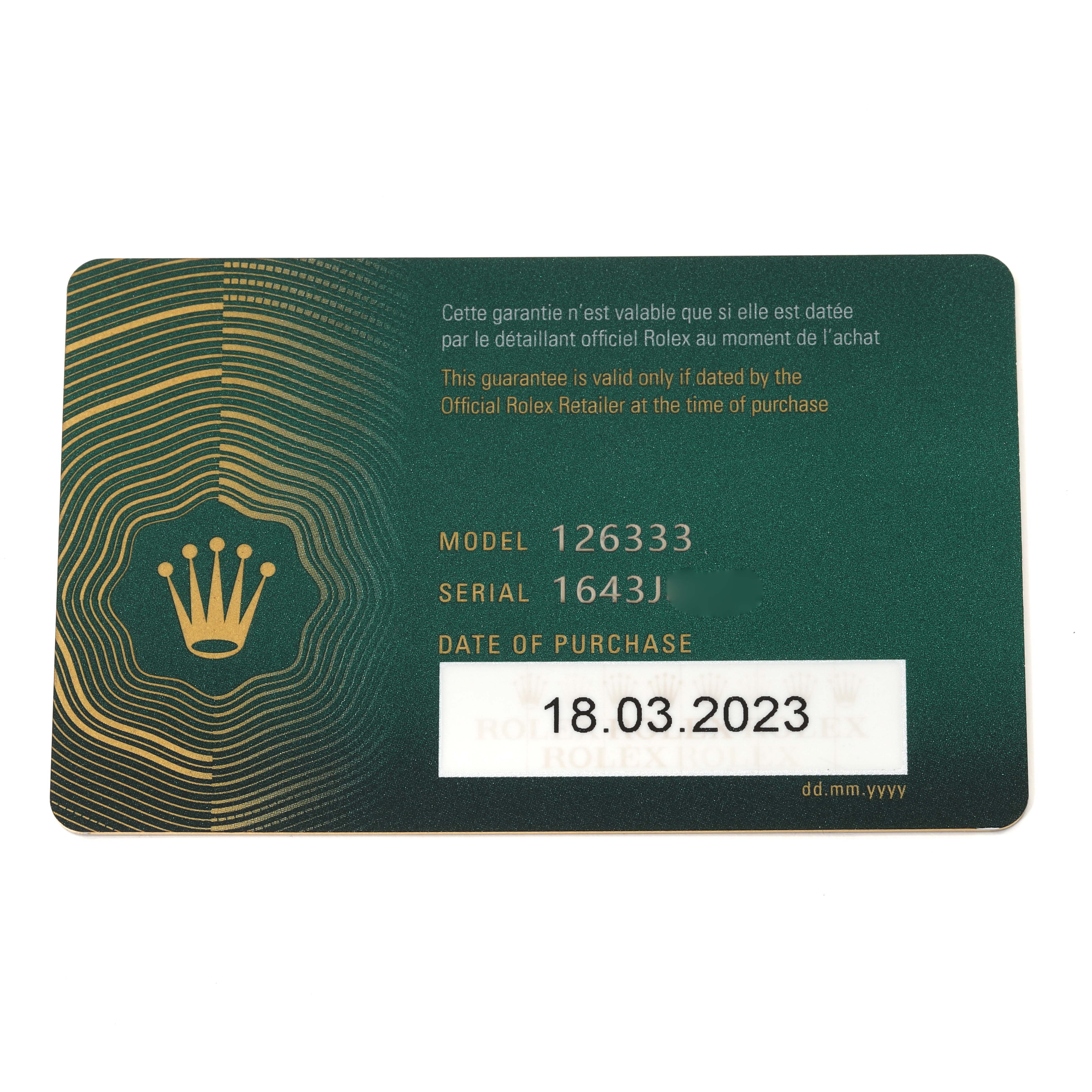 This image shows the warranty card for a Rolex Datejust 41 126333 Men's Steel and Gold (two tone) Champagne Dial 126333 Men's Steel and Gold (two tone) Champagne Dial model 126333, including the serial number and purchase date.