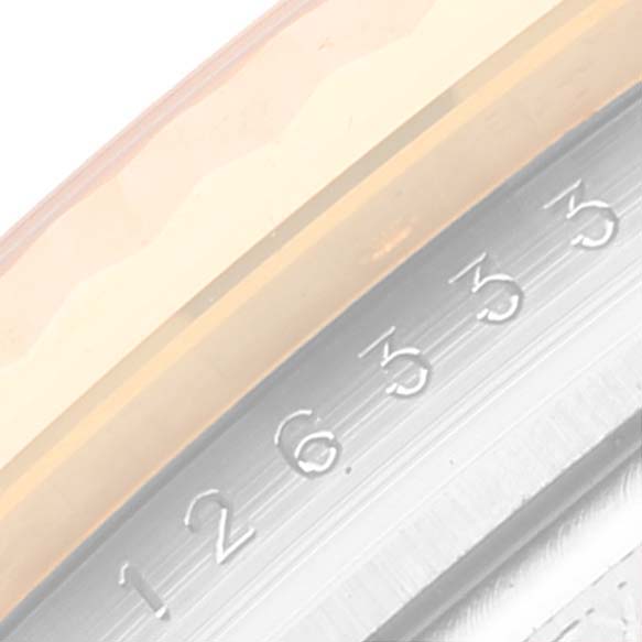 The image shows a close-up angle of the bezel and part of the dial of a Rolex Datejust 41 126333 Men's Steel and Gold (two tone) Silver Dial 126333 Men's Steel and Gold (two tone) Silver Dial model, highlighting the engraved numbers.