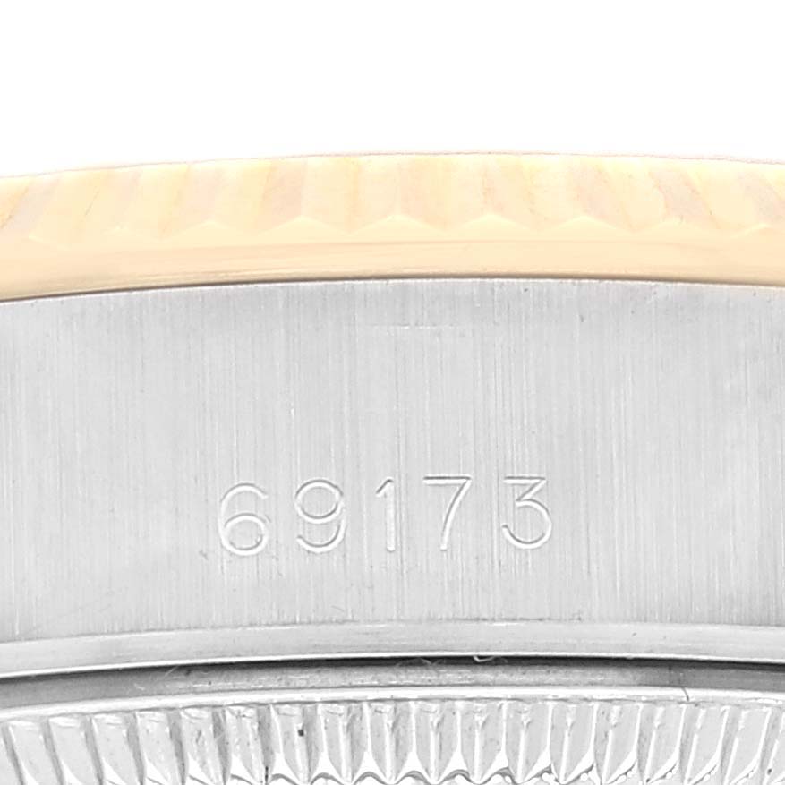 This image shows a close-up of the Rolex Datejust 69173 Women's Steel and Gold (two tone) Champagne Dial 69173 Women's Steel and Gold (two tone) Champagne Dial model, specifically the side of the case with the model number 69173.