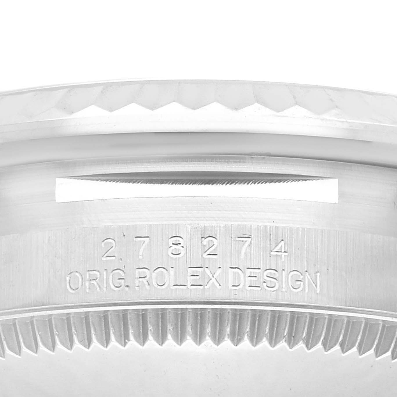 This image shows a close-up angle of the bezel and case, revealing the model number and "Orig. Rolex Design" engraving of the Rolex Mid-Size 278274 Women
s Stainless Steel White Dial 278274 Women
s Stainless Steel White Dial watch.