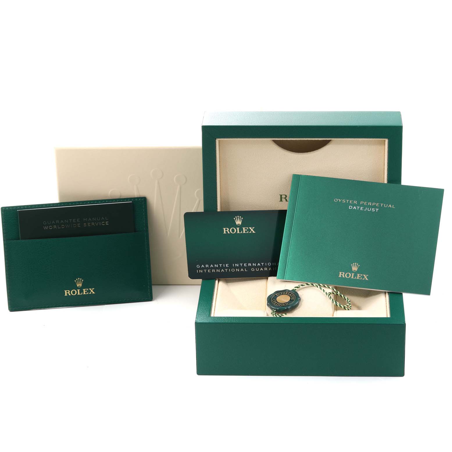The image shows a Rolex Mid-Size 278274 Women
s Stainless Steel White Dial 278274 Women
s Stainless Steel White Dial watch box, guarantee manual, warranty card, and Oyster Perpetual Datejust booklet.