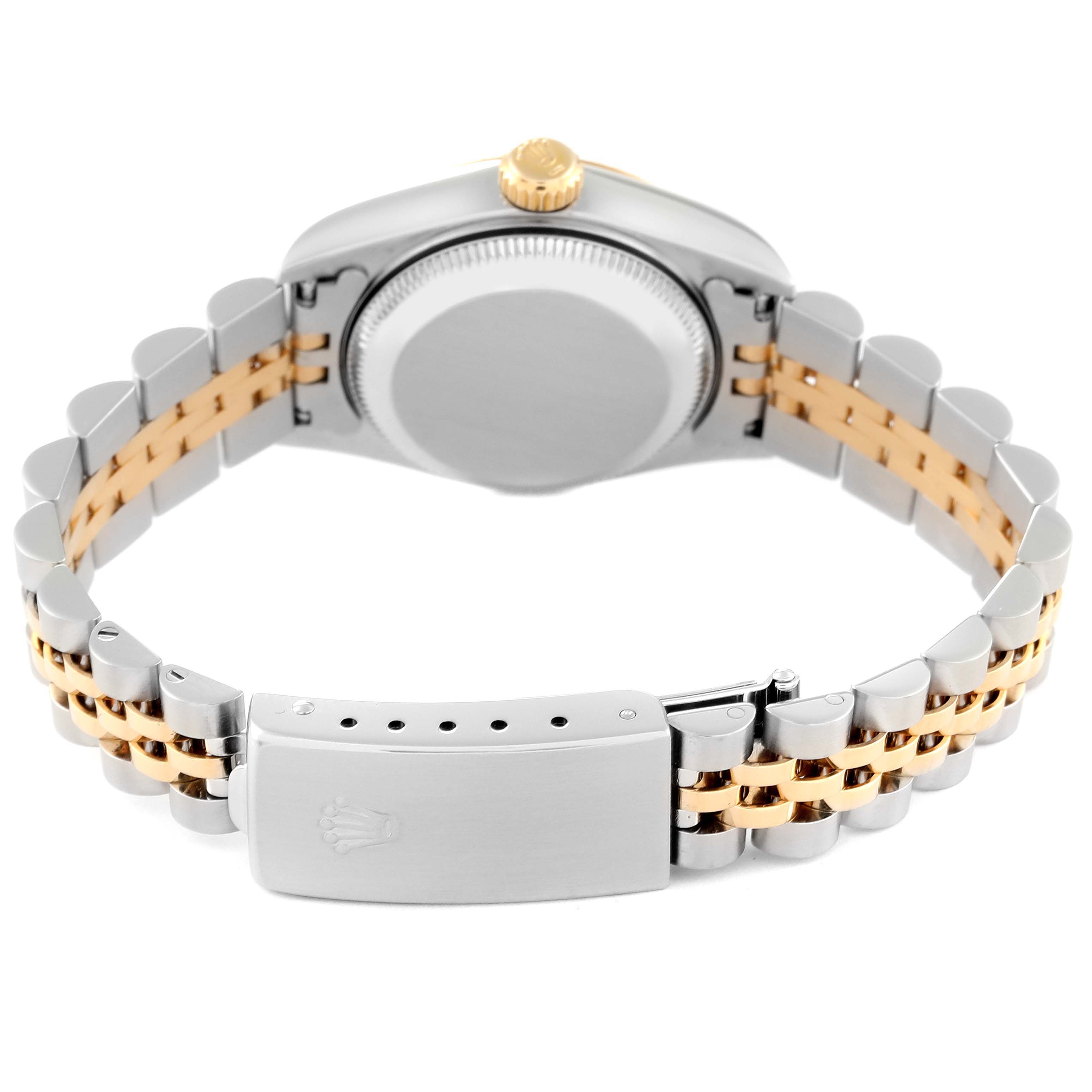 This is a rear view of the Rolex Datejust 79173 Women's Steel and Gold (two tone) Mother of Pearl Dial 79173 Women's Steel and Gold (two tone) Mother of Pearl Dial watch, showcasing the back case and two-tone metal bracelet with the clasp open.