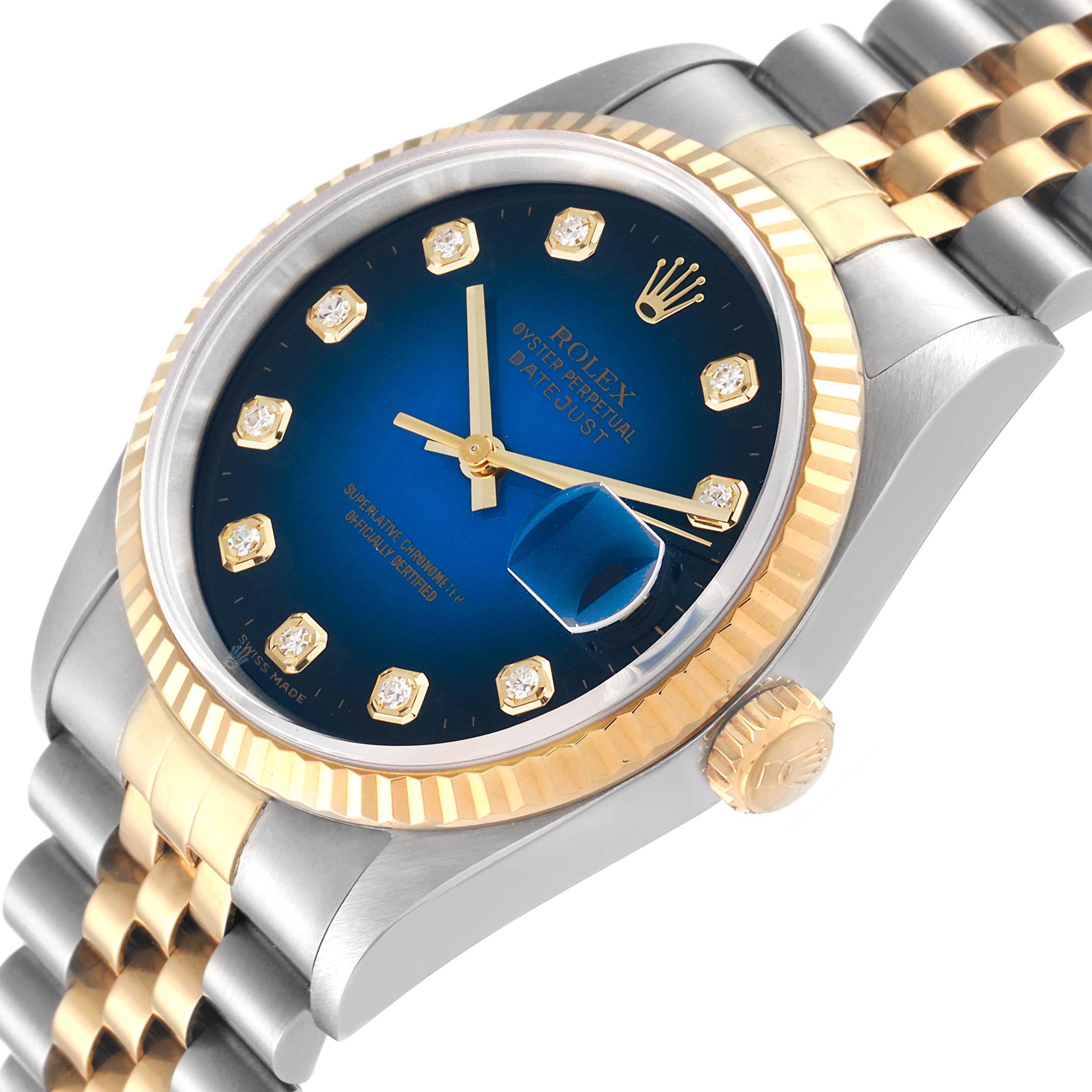 The image shows a close-up angle of a Rolex Datejust 16233 Men's Steel and Gold (two tone) Blue Dial 16233 Men's Steel and Gold (two tone) Blue Dial model, highlighting the blue dial, bezel, crown, and two-tone bracelet.