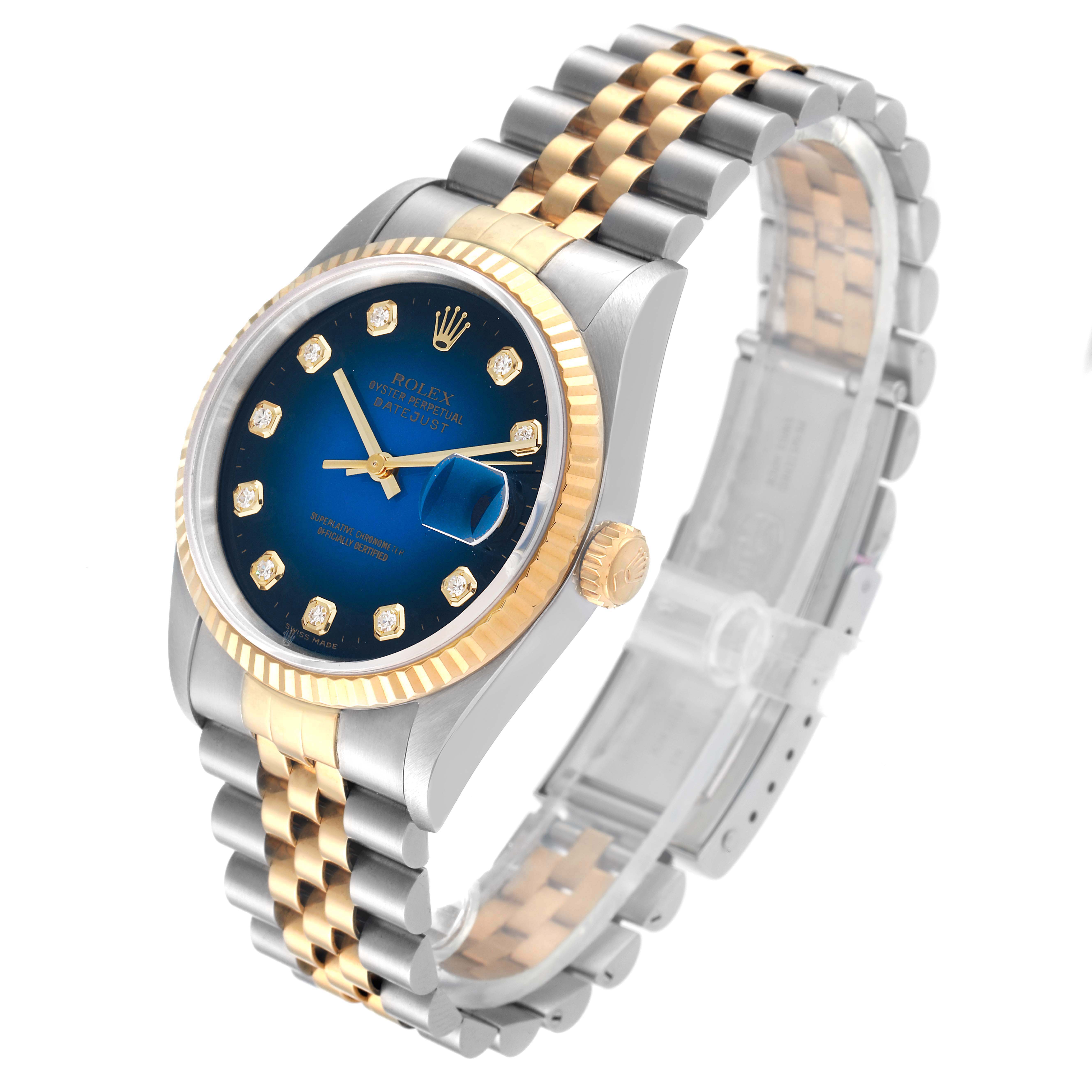 This image shows a Rolex Datejust 16233 Men's Steel and Gold (two tone) Blue Dial 16233 Men's Steel and Gold (two tone) Blue Dial watch at a three-quarters angle, highlighting the blue dial, gold fluted bezel, and two-tone bracelet.