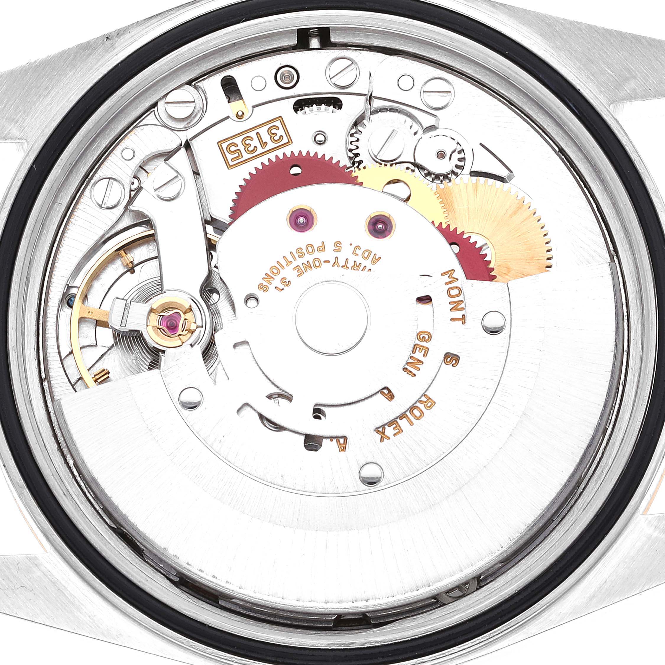 The image shows the internal mechanism of a Rolex Datejust 16233 Men's Steel and Gold (two tone) Champagne Dial 16233 Men's Steel and Gold (two tone) Champagne Dial watch viewed from the back.