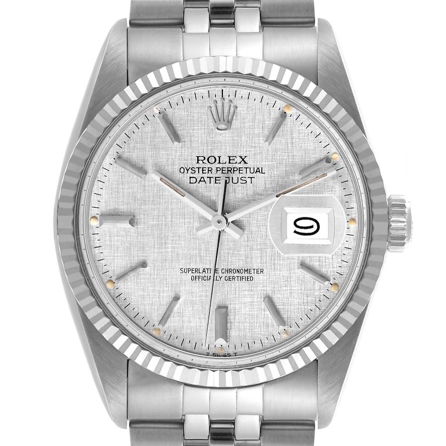 The Rolex Datejust is shown from a frontal angle, highlighting the dial, fluted bezel, and bracelet.