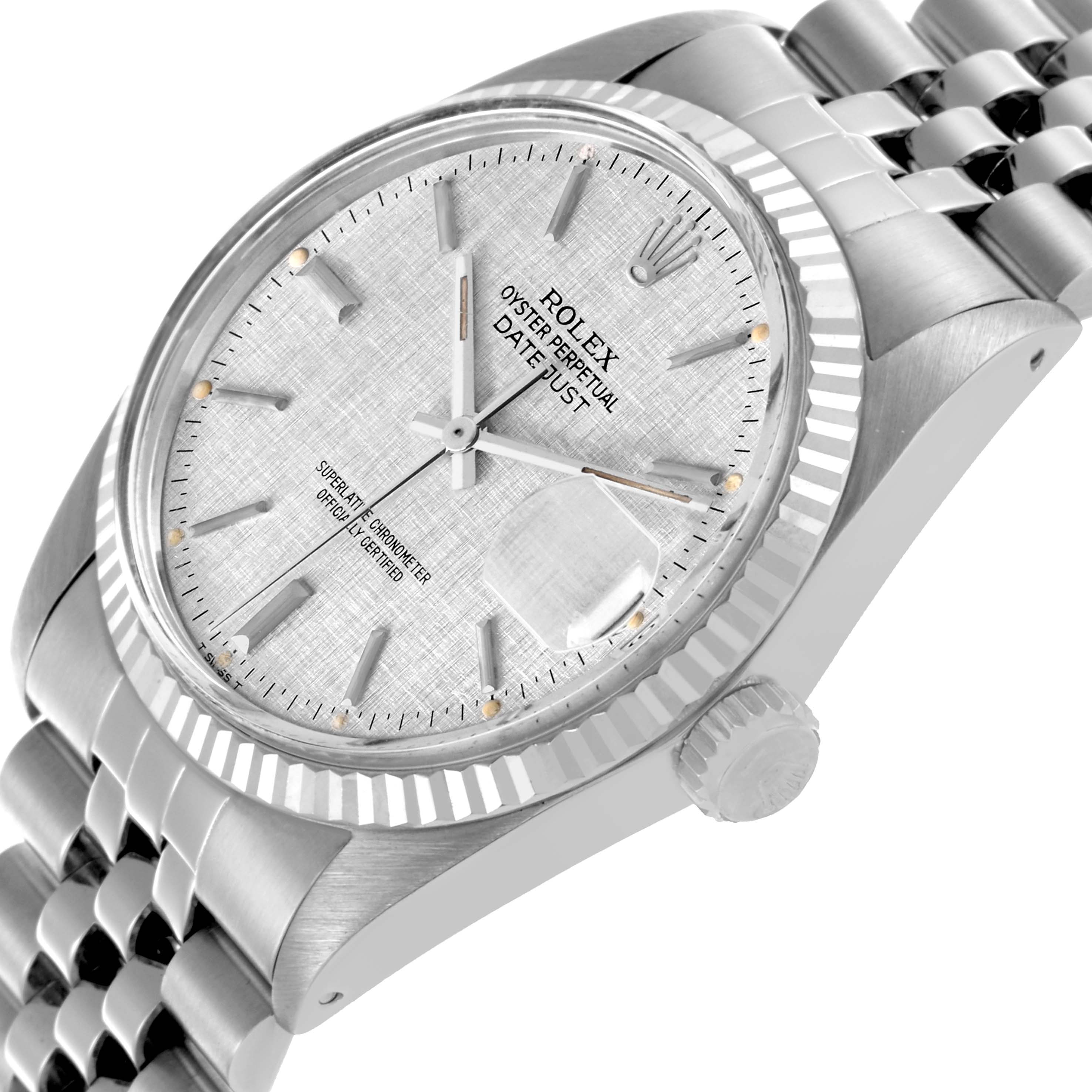 The Rolex Datejust 16014 Men
s Stainless Steel Silver Dial 16014 Men
s Stainless Steel Silver Dial watch is shown at an angled view, highlighting the dial, fluted bezel, crown, and Jubilee bracelet.