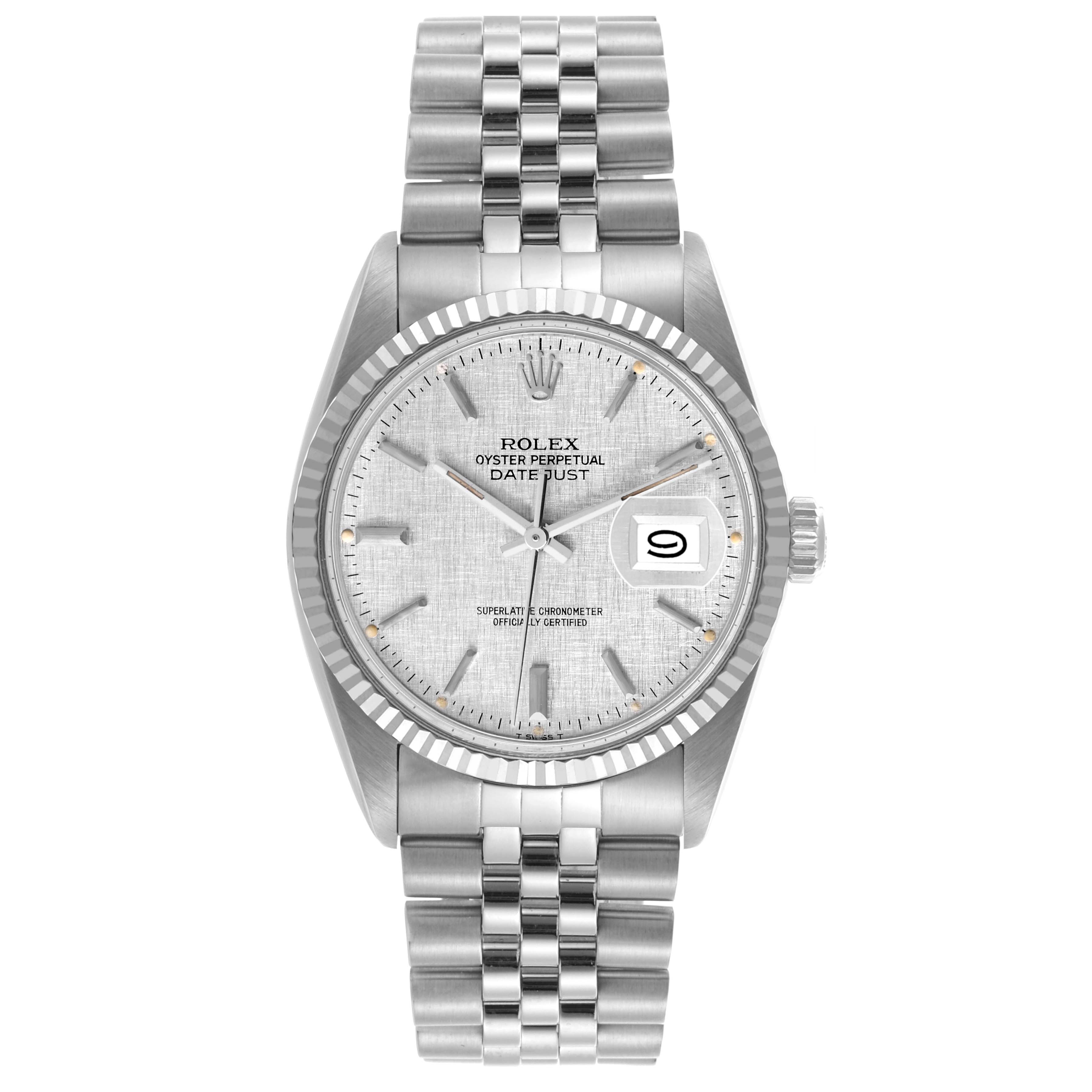 The Rolex Datejust 16014 Men
s Stainless Steel Silver Dial 16014 Men
s Stainless Steel Silver Dial watch is shown from a front view displaying its face, bezel, crown, and bracelet in full detail.