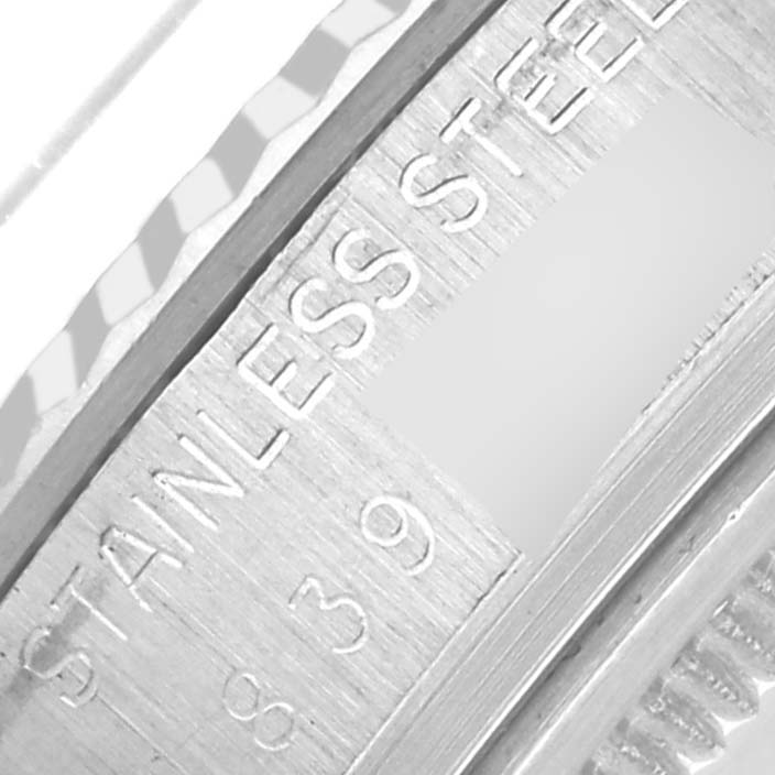 The image shows an angled close-up of the inner bezel with engravings on a Rolex Vintage Collection 16014 Men
s Stainless Steel Silver Dial 16014 Men
s Stainless Steel Silver Dial watch.