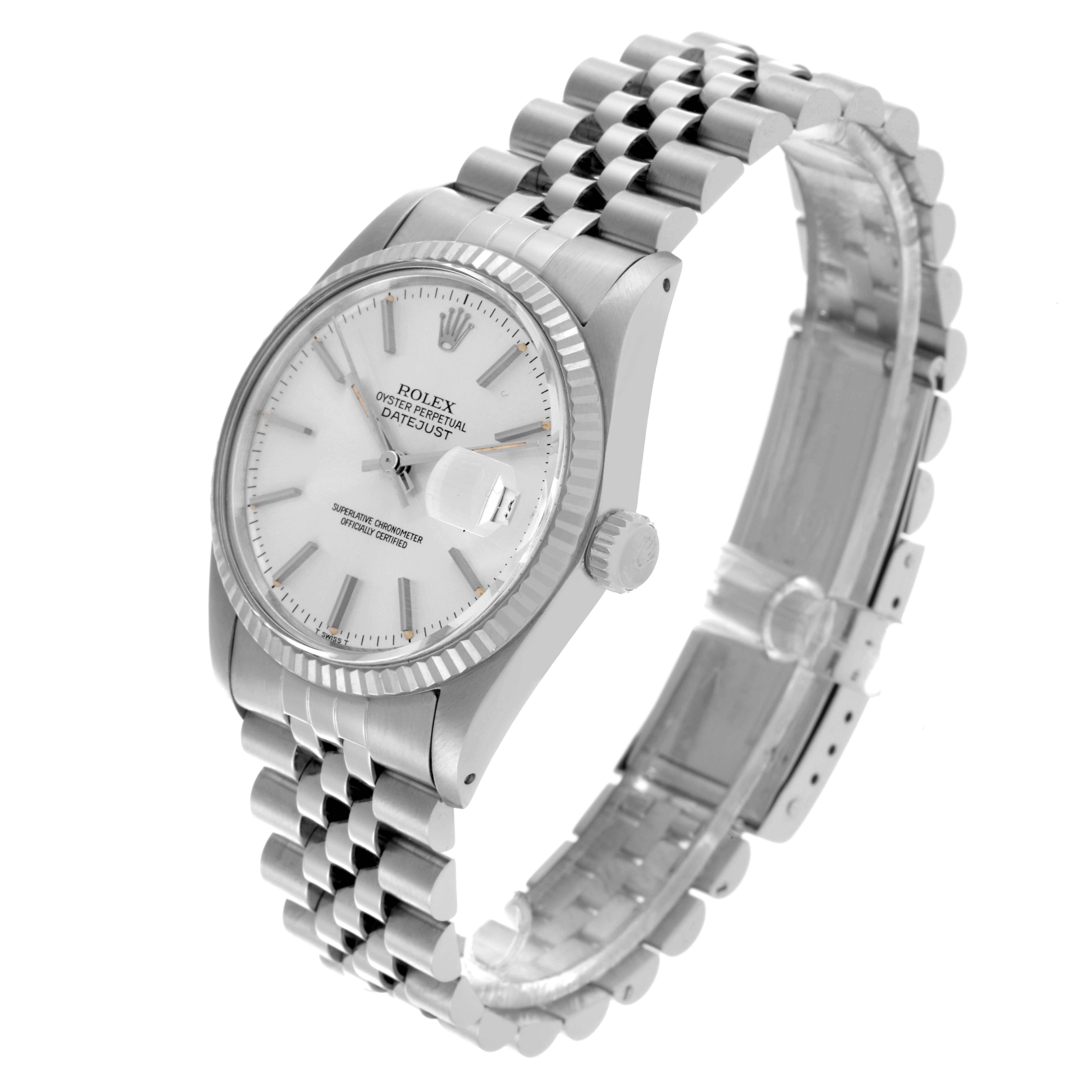 The Vintage Collection Rolex watch is shown at a three-quarter angle, highlighting the face, bezel, crown, and jubilee bracelet.