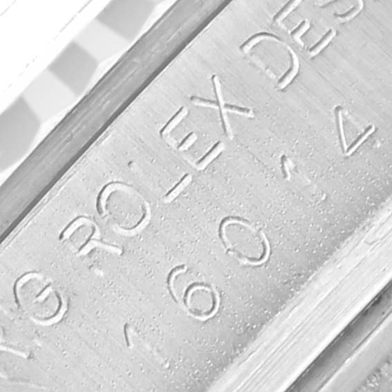 The image shows a close-up angle of the engraved inner bezel of a Rolex Vintage Collection 16014 Men
s Stainless Steel Silver Dial 16014 Men
s Stainless Steel Silver Dial watch.