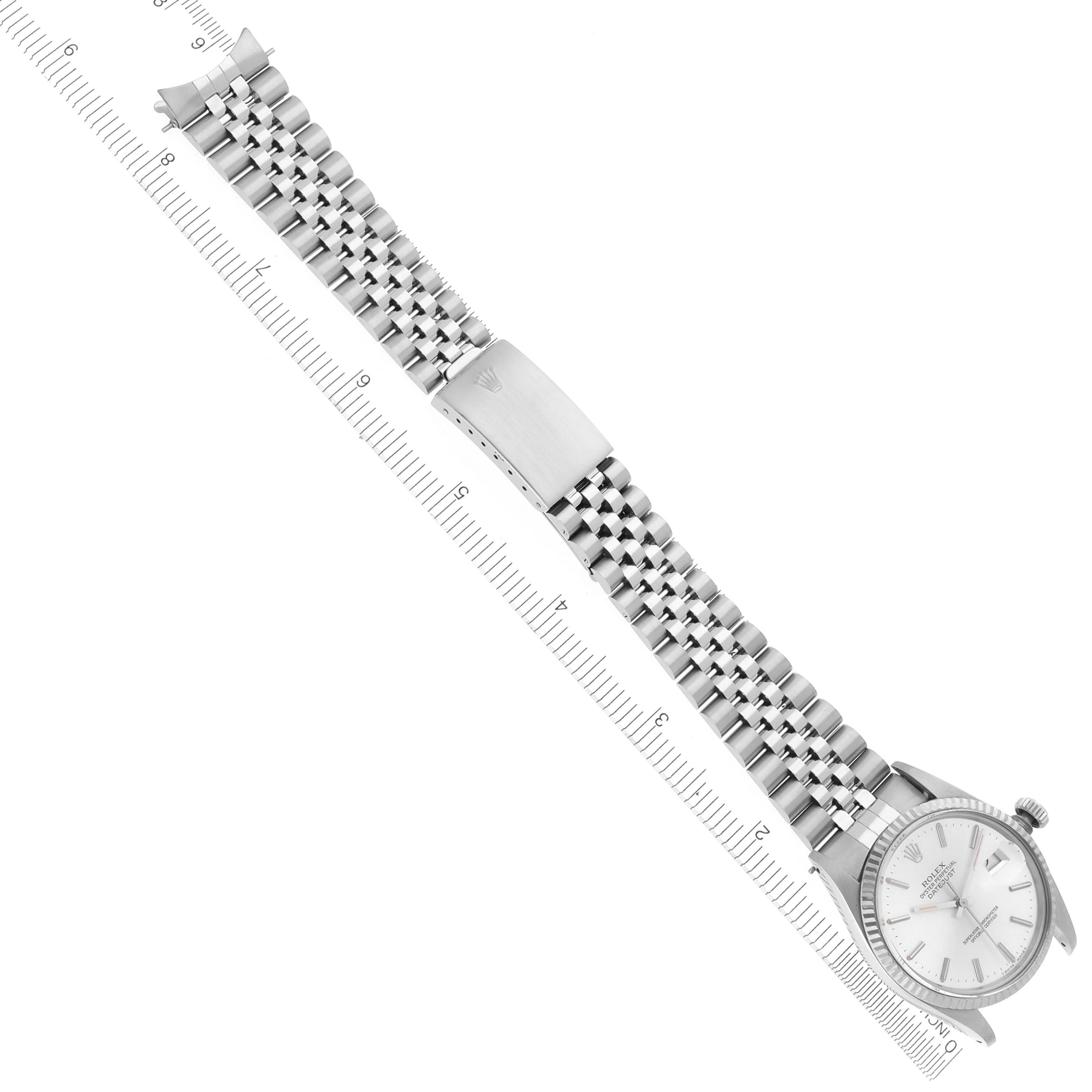 The Rolex Vintage Collection 16014 Men
s Stainless Steel Silver Dial 16014 Men
s Stainless Steel Silver Dial watch is shown from a top-down angle, highlighting the face, bracelet, and clasp.