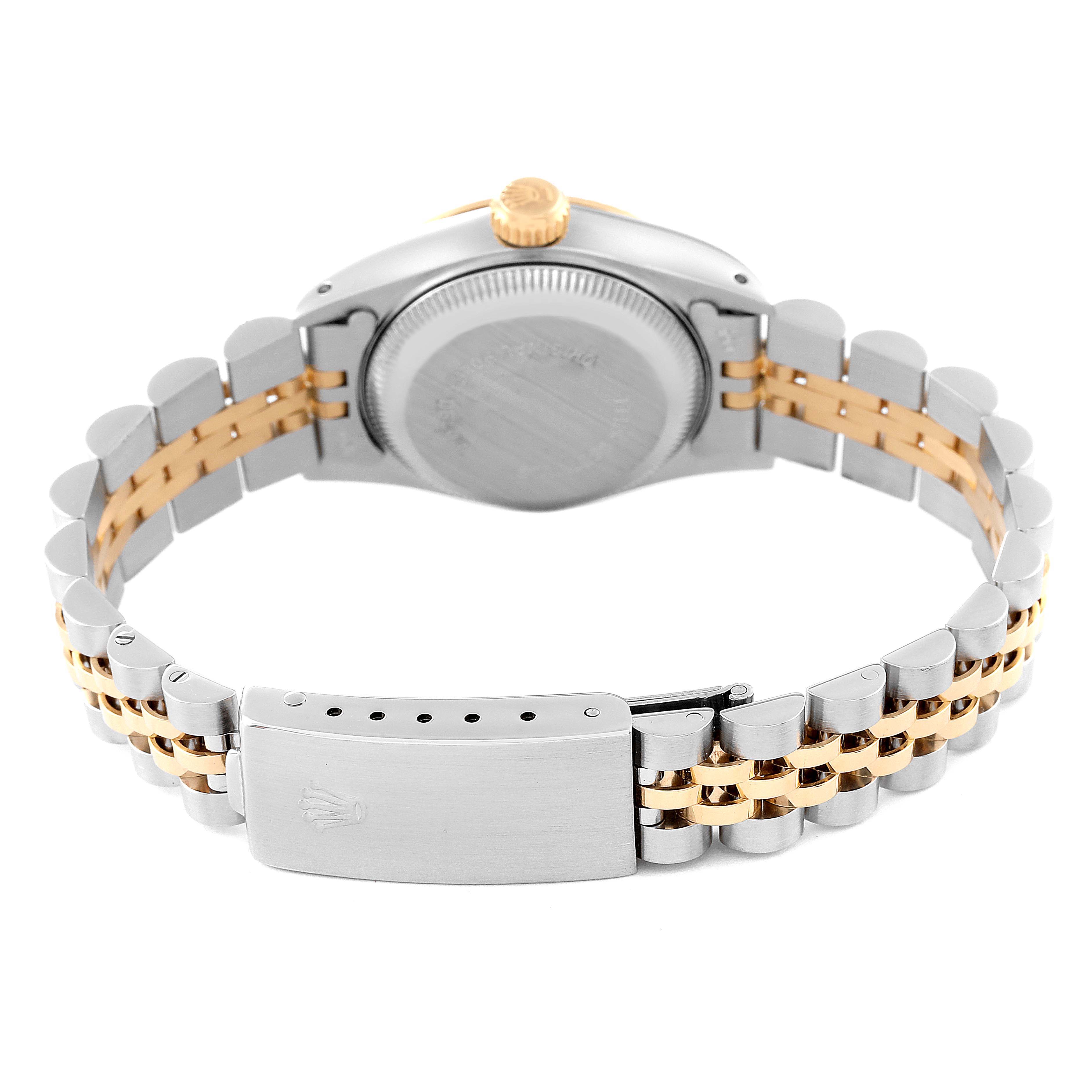 This image shows the back view of a Rolex Datejust 69173 Women's Steel and Gold (two tone) Champagne Dial 69173 Women's Steel and Gold (two tone) Champagne Dial watch, highlighting its two-tone bracelet and clasp.