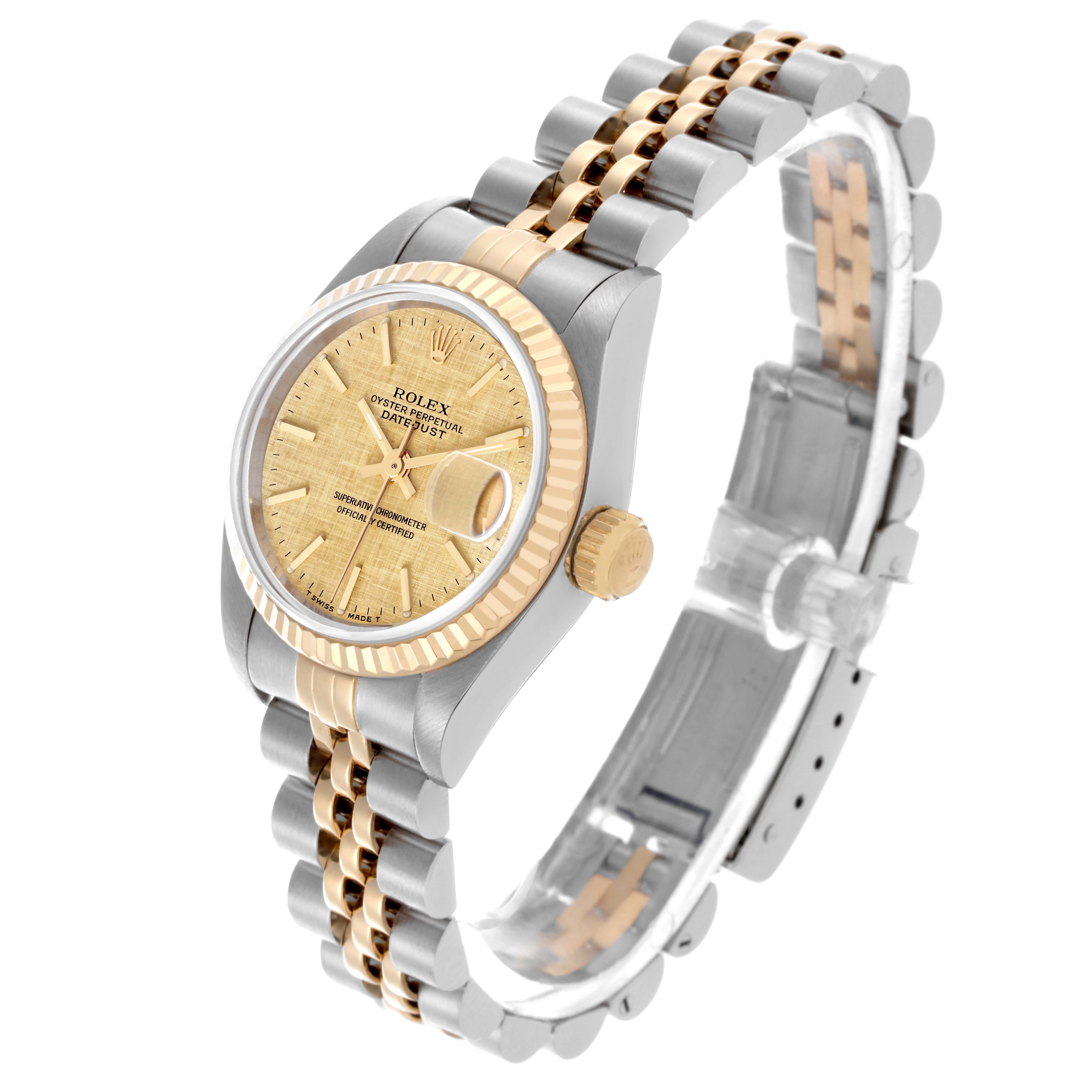 The Rolex Datejust 69173 Women's Steel and Gold (two tone) Champagne Dial 69173 Women's Steel and Gold (two tone) Champagne Dial watch is shown at a three-quarter angle, highlighting its dial, case, fluted bezel, and jubilee bracelet.
