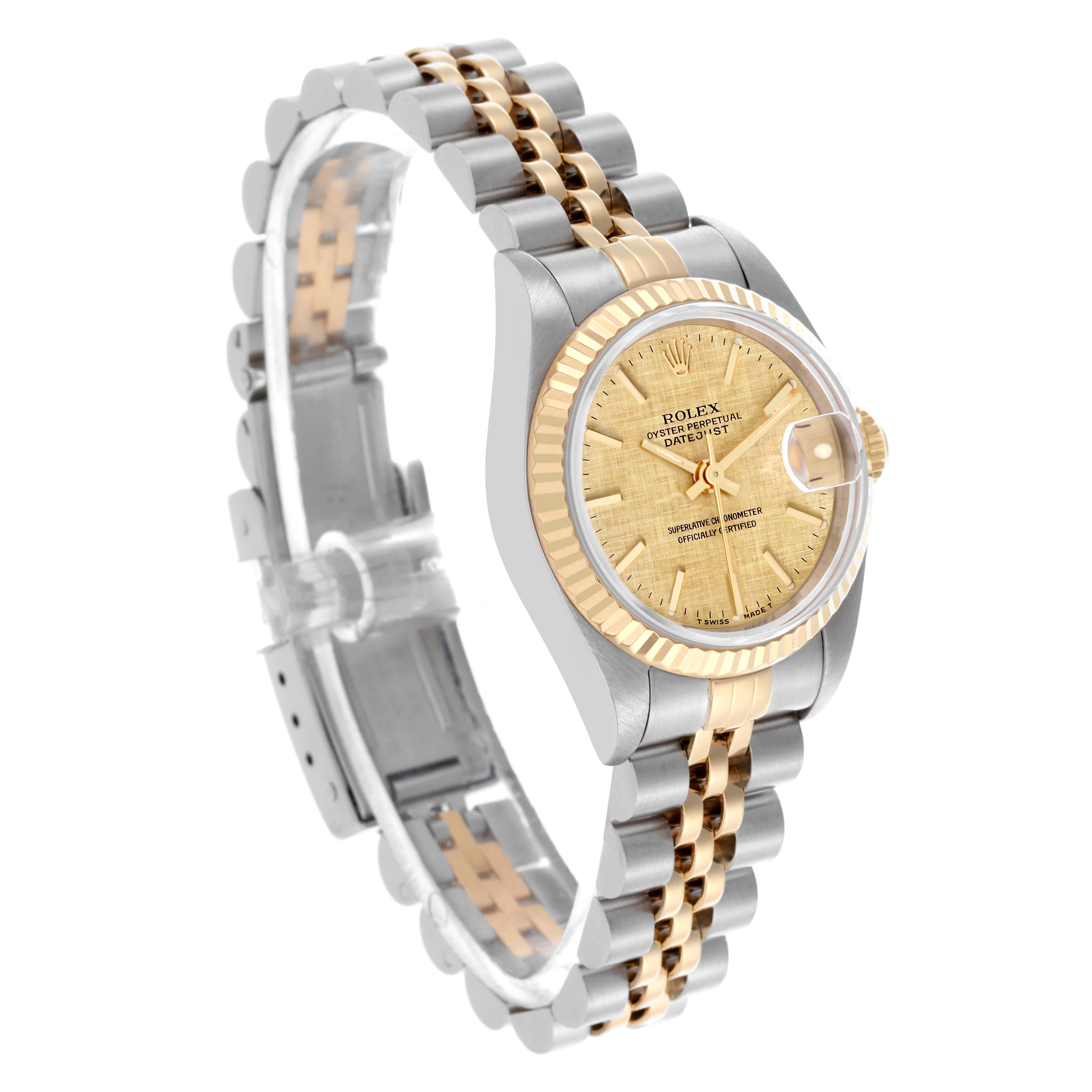 The Rolex Datejust 69173 Women's Steel and Gold (two tone) Champagne Dial 69173 Women's Steel and Gold (two tone) Champagne Dial watch is shown at a three-quarter angle, highlighting the dial, bezel, and two-tone bracelet.