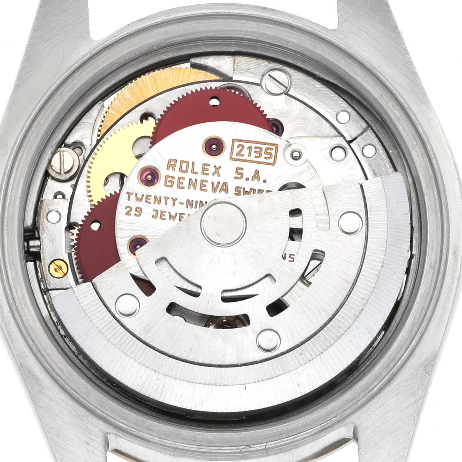 The image shows the inner movement of a Rolex Datejust 69173 Women's Steel and Gold (two tone) Champagne Dial 69173 Women's Steel and Gold (two tone) Champagne Dial watch, highlighting gears and the rotor.