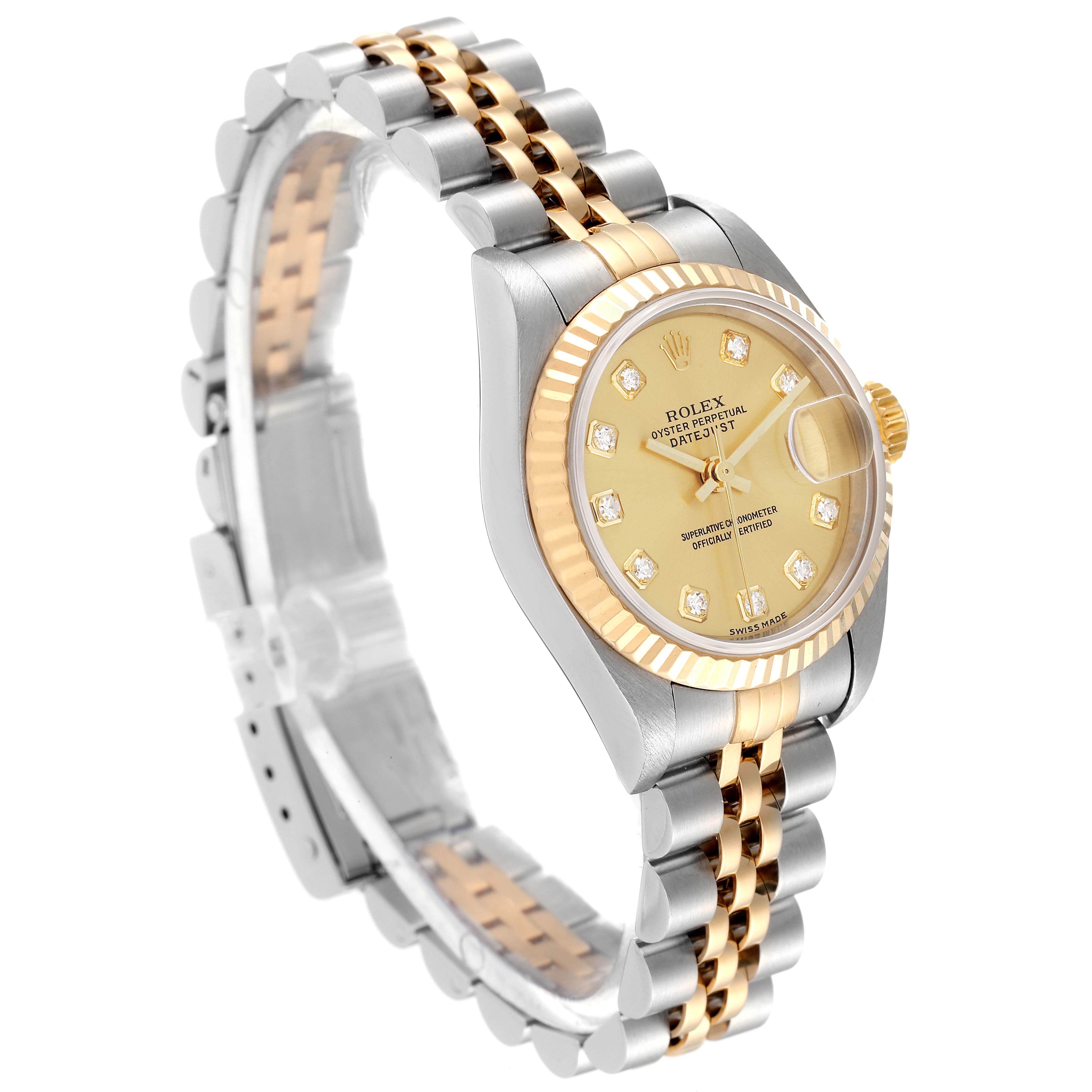 This image shows a Rolex Datejust 79173 Women's Steel and Gold (two tone) Champagne Dial 79173 Women's Steel and Gold (two tone) Champagne Dial watch from an angled side view, highlighting its gold dial, fluted bezel, and two-tone bracelet.