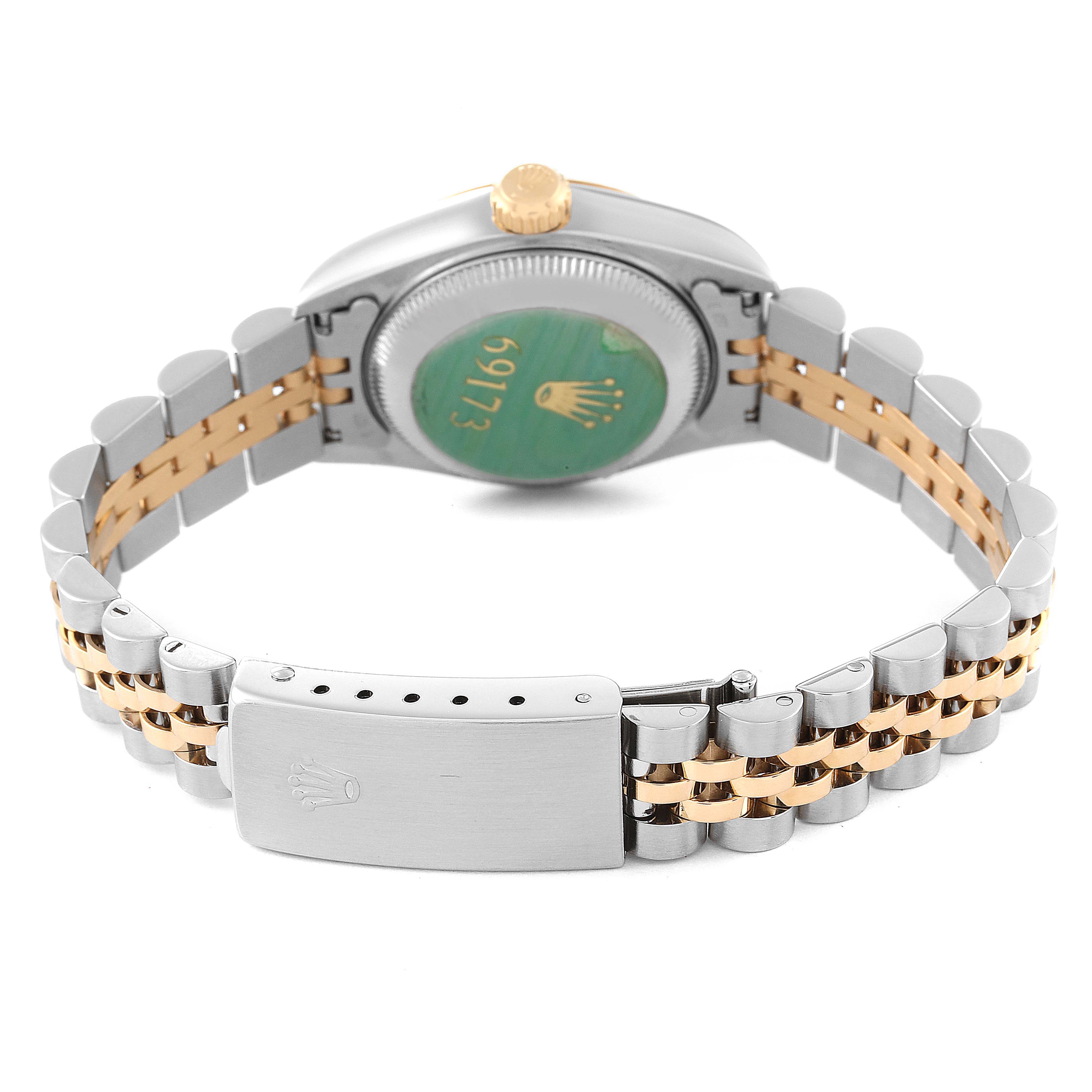 This image displays the back view of a Rolex Datejust 69173 Women's Steel and Gold (two tone) Beige Dial 69173 Women's Steel and Gold (two tone) Beige Dial watch, focusing on the case back, crown, and Jubilee bracelet with clasp.