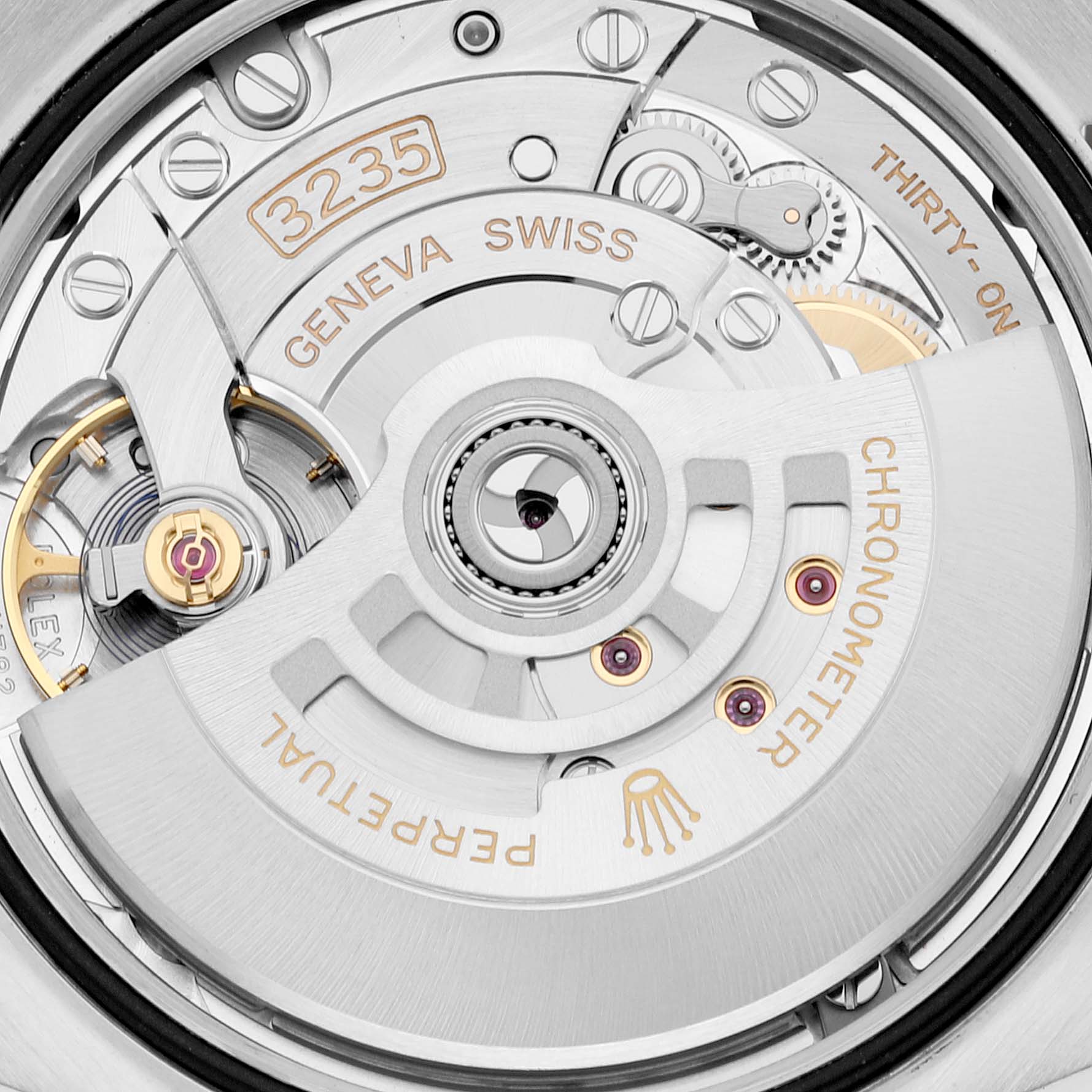 This image shows a close-up of the movement mechanism inside a Rolex Datejust 126233 Men's Steel and Gold (two tone) Silver Dial 126233 Men's Steel and Gold (two tone) Silver Dial watch, highlighting the 3235 Caliber and intricate components.