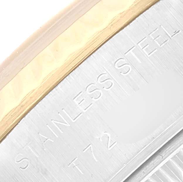 Close-up of the case side of a Rolex Datejust 69173 Women's Steel and Gold (two tone) White Dial 69173 Women's Steel and Gold (two tone) White Dial watch, showing "STAINLESS STEEL" engraving.