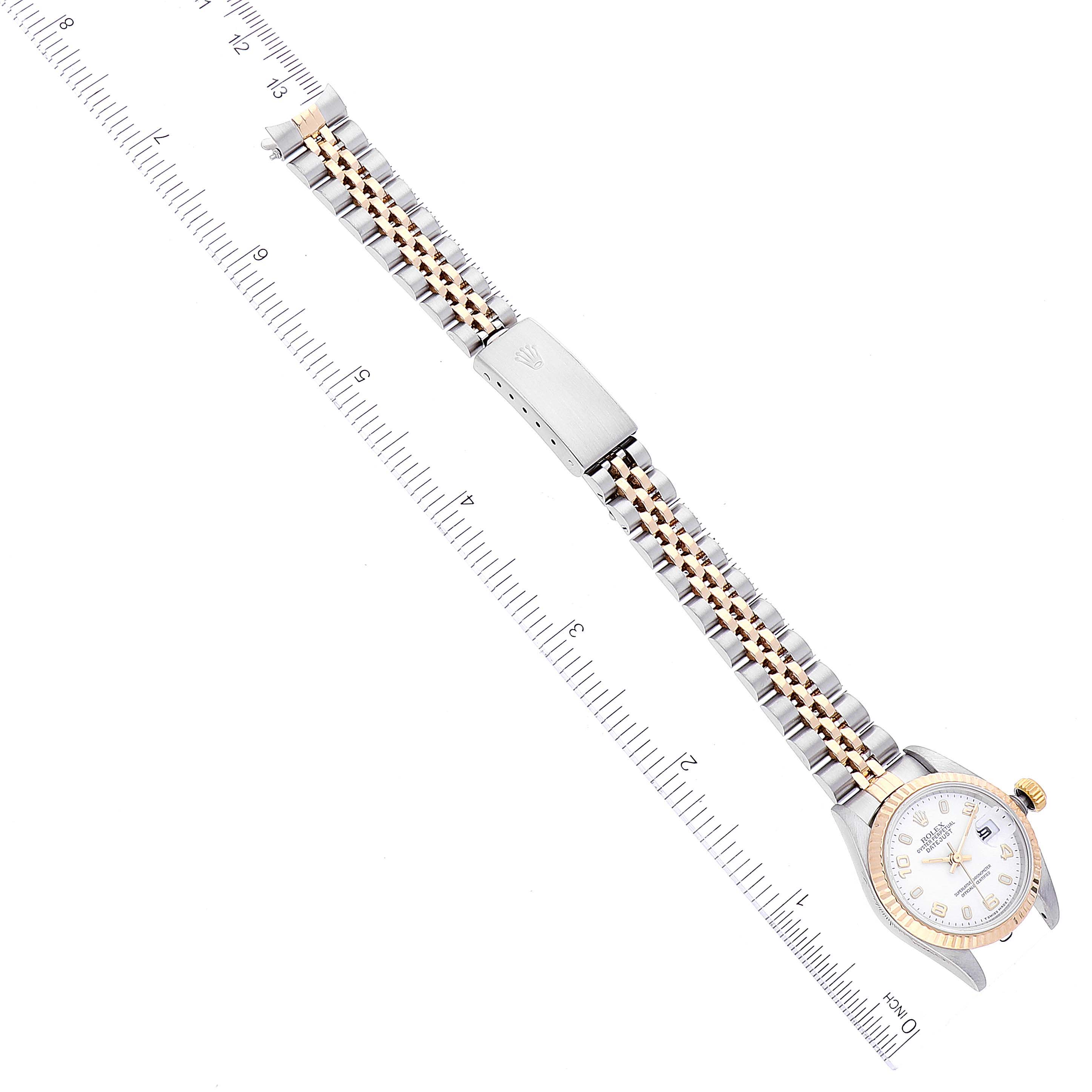 The image shows a Rolex Datejust 69173 Women's Steel and Gold (two tone) White Dial 69173 Women's Steel and Gold (two tone) White Dial watch photographed from above, highlighting the dial, bezel, and jubilee bracelet.