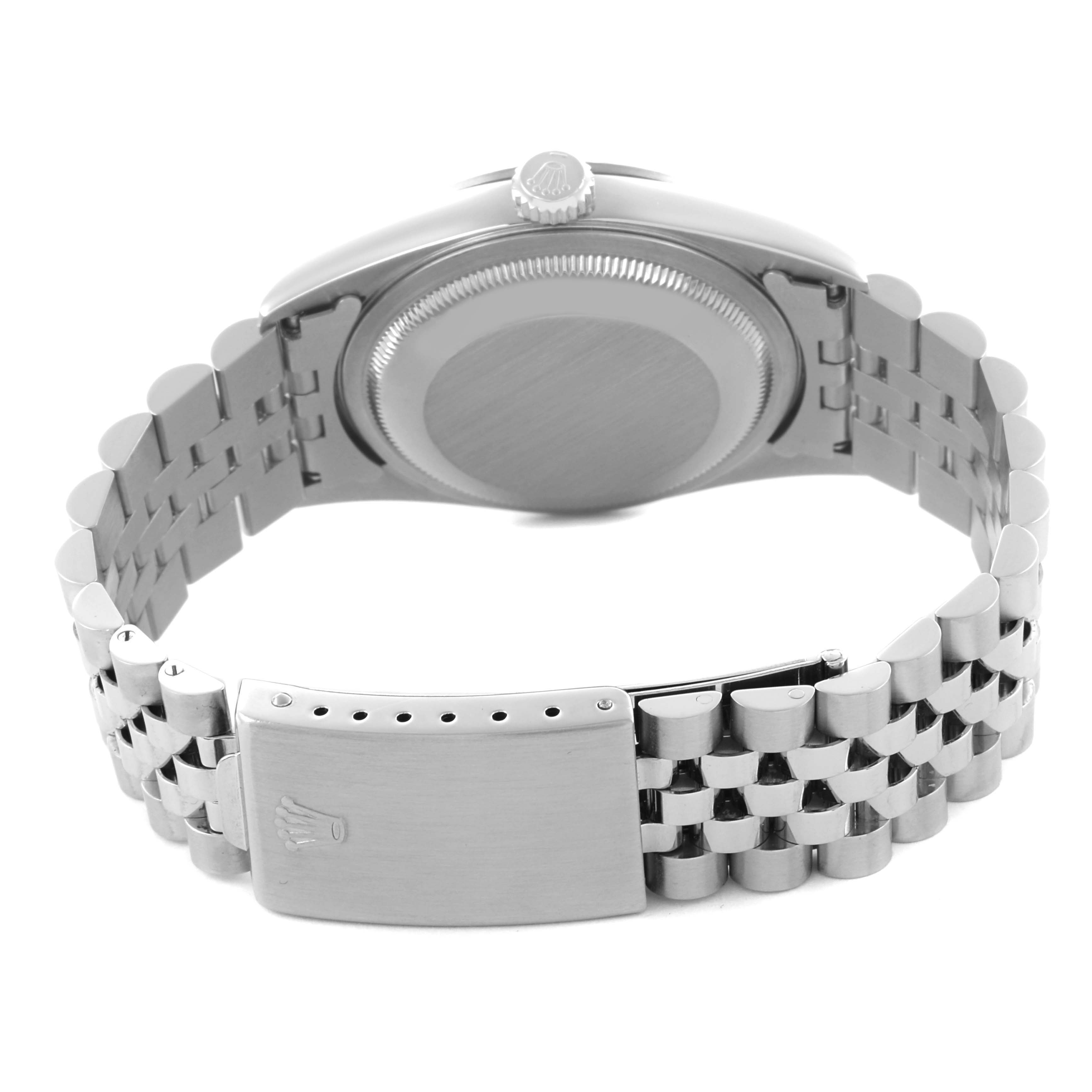 The image shows the back of a Rolex Datejust 16234 Men's Stainless Steel White Dial 16234 Men's Stainless Steel White Dial watch, focusing on the case back, crown, and the bracelet with the clasp.