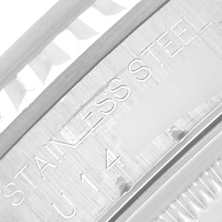 The image shows a close-up of the Rolex Datejust 16234 Men's Stainless Steel White Dial 16234 Men's Stainless Steel White Dial watch's case, highlighting the stainless steel etching.