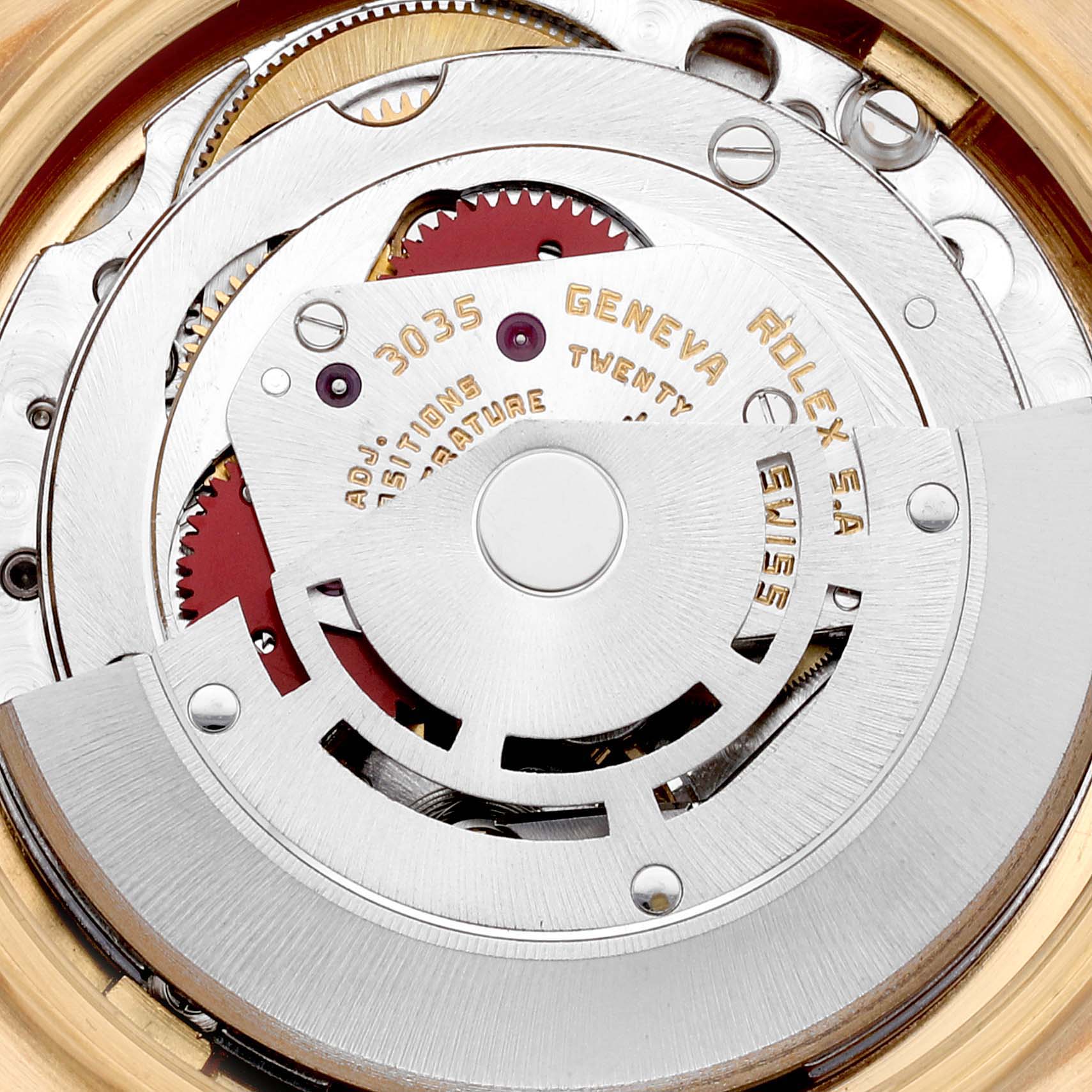 The image shows the intricate internal movement of a Vintage Collection Rolex model, highlighting the rotor and gear mechanism.