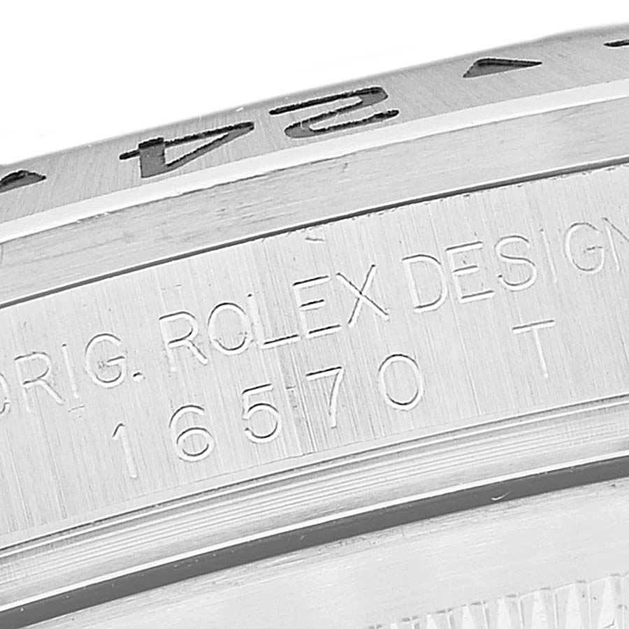 This is a close-up angle showing the bezel and engraved design details on the Rolex Explorer 16570T Men
s Stainless Steel Black Dial 16570T Men
s Stainless Steel Black Dial model 16570.