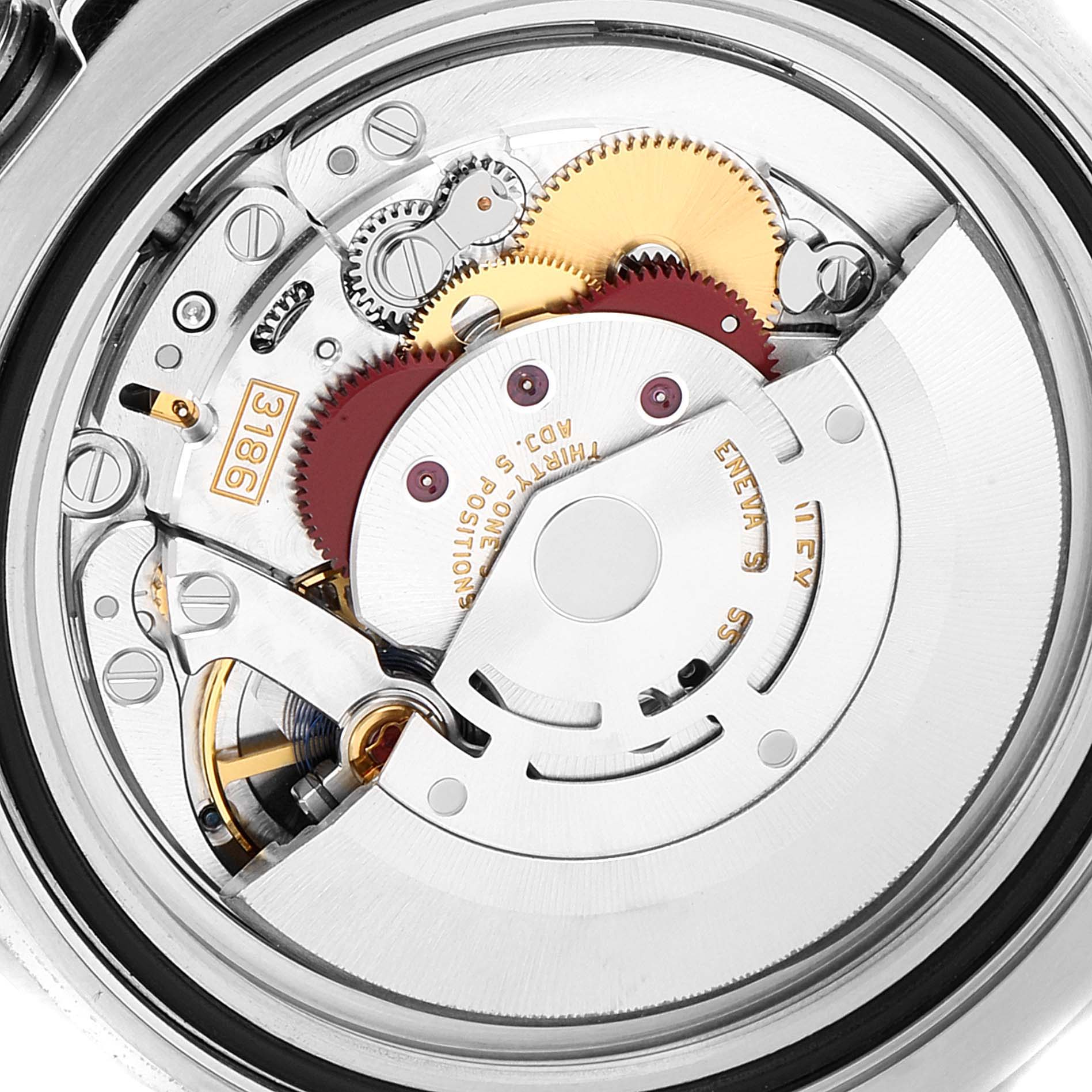 The image shows a close-up view of the intricate mechanical movement parts of a Rolex GMT-Master 116710 Men
s Stainless Steel Black Dial 116710 Men
s Stainless Steel Black Dial watch.