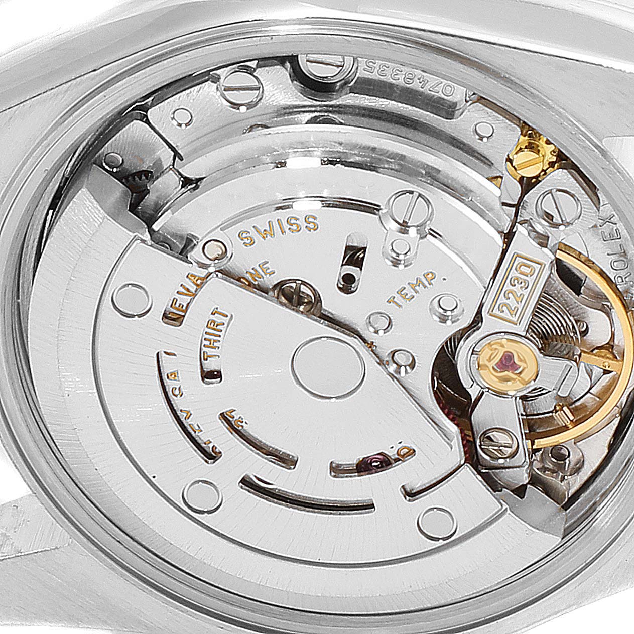 The close-up image shows the inner mechanism and movement of the Rolex Oyster Perpetual 76080 Women
s Stainless Steel Blue Dial 76080 Women
s Stainless Steel Blue Dial watch.